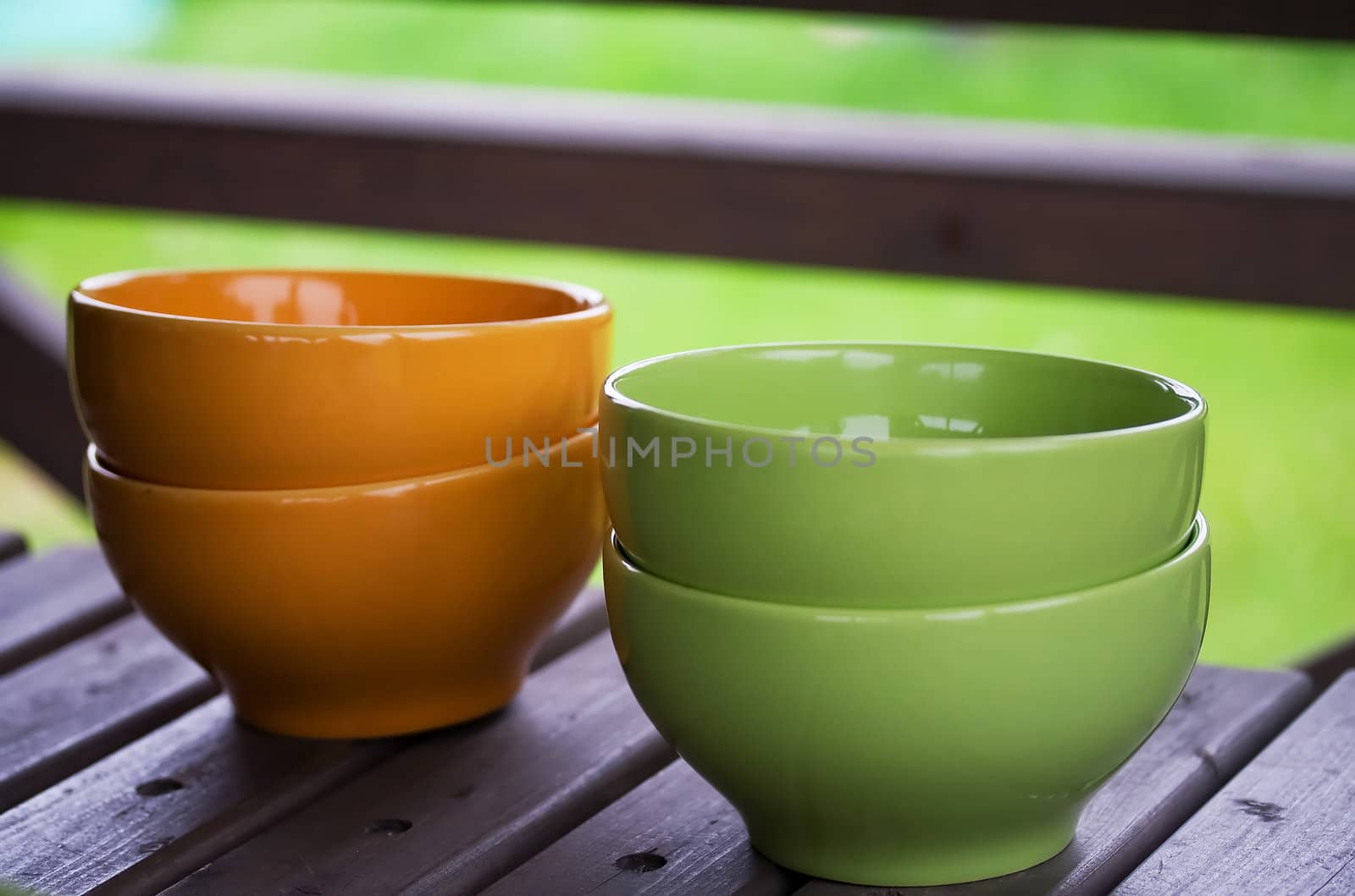 Yellow and green bowls on a table