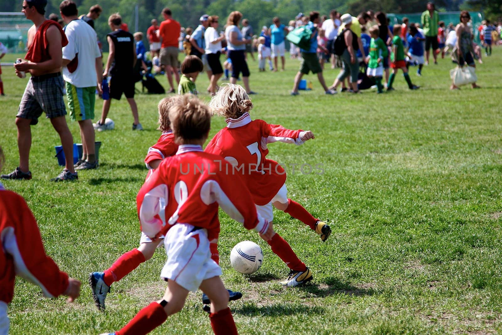 boys playing footballmatch by Bildehagen