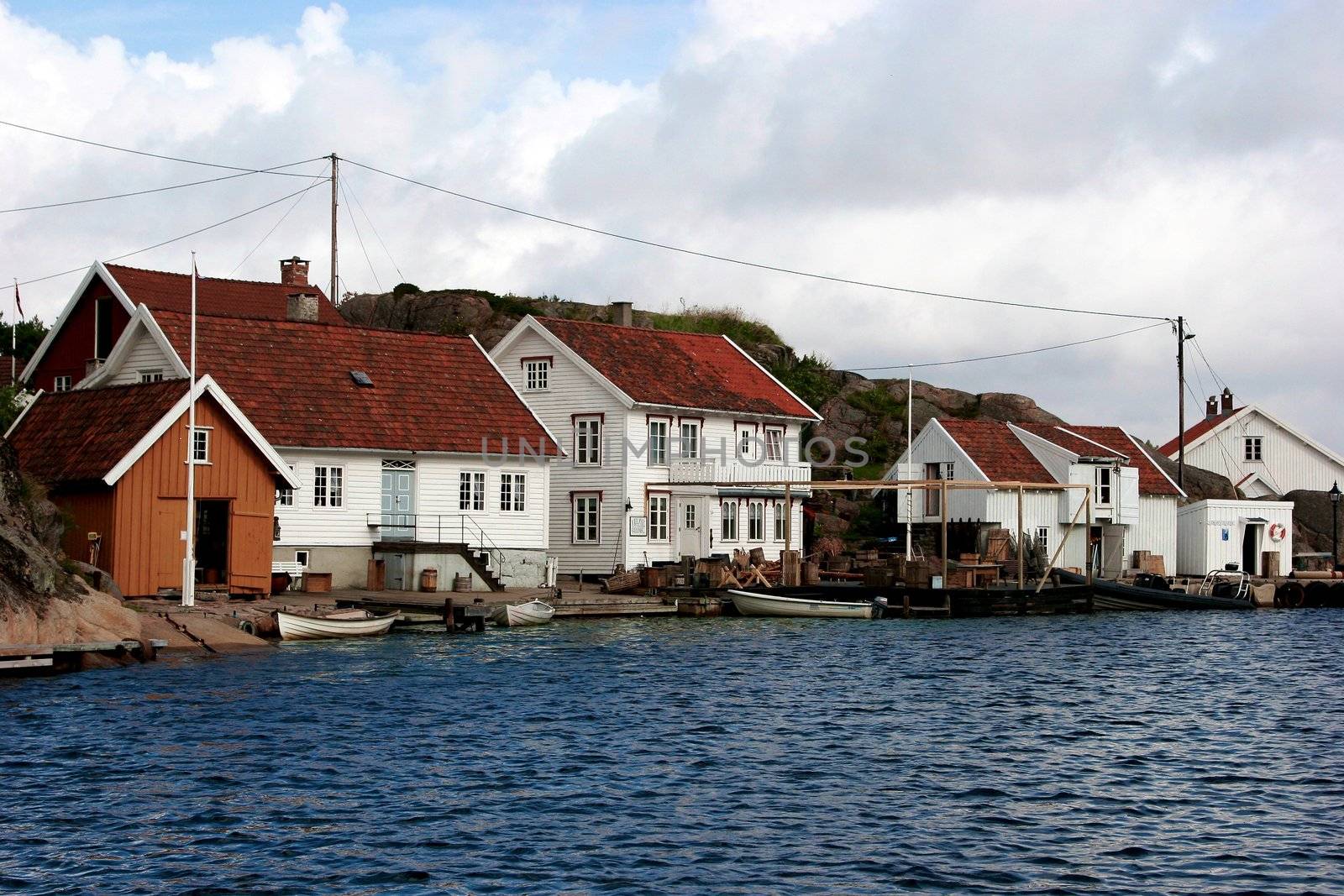 View from sea of a town by Bildehagen