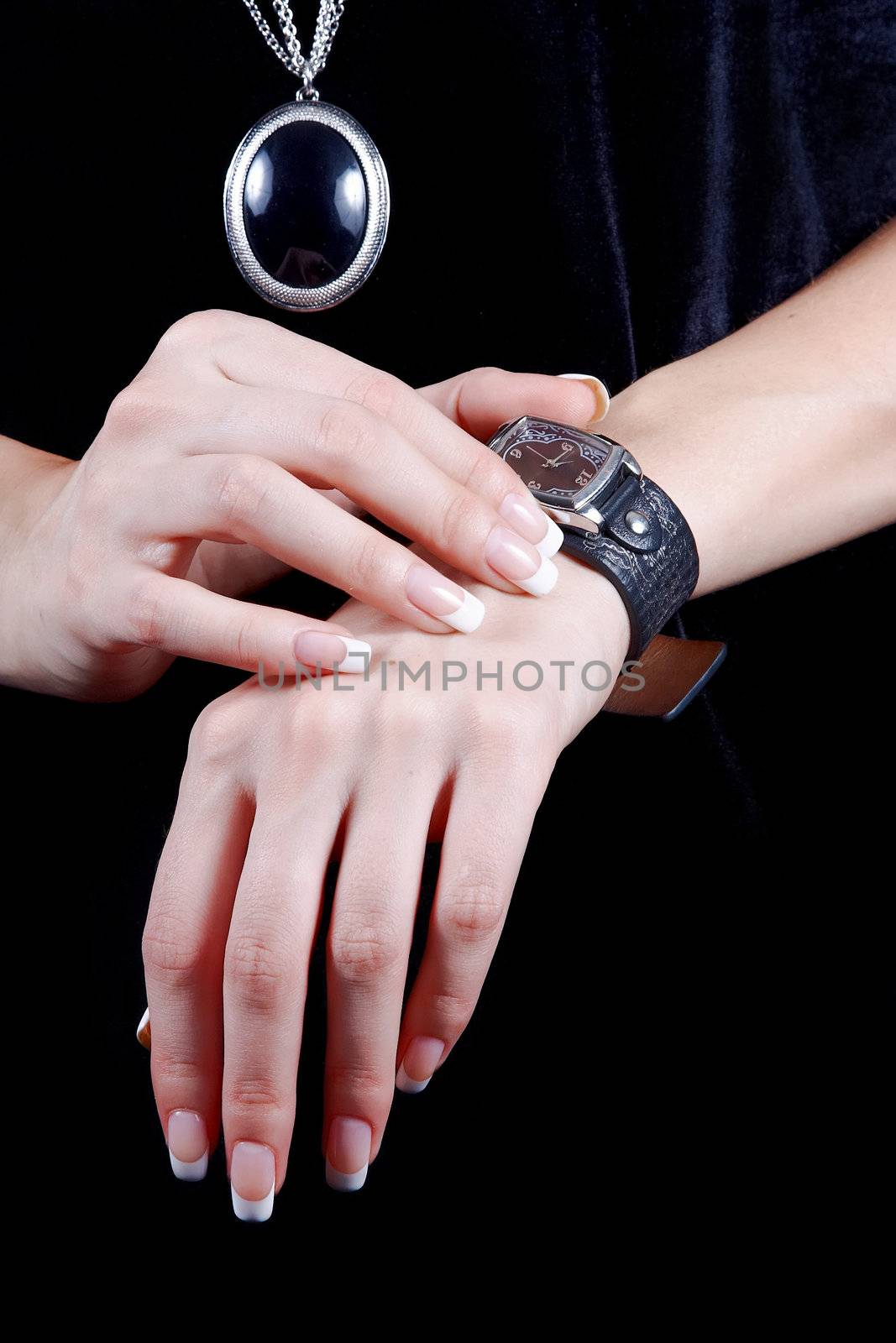 Female hands with a watch by Azaliya