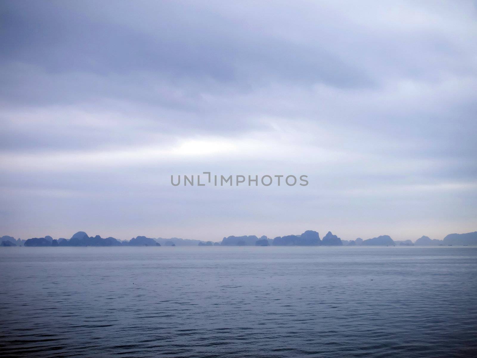 Island and Sea in Halong Bay, Vietnam by siraanamwong