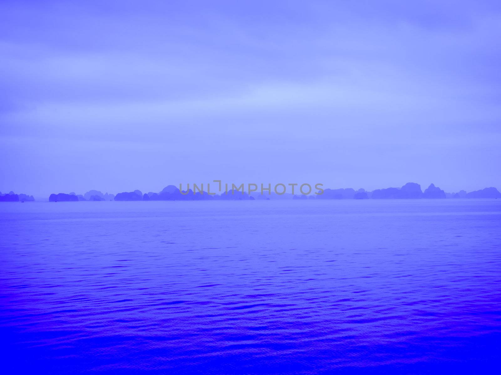 Island and Sea in Halong Bay, Vietnam by siraanamwong