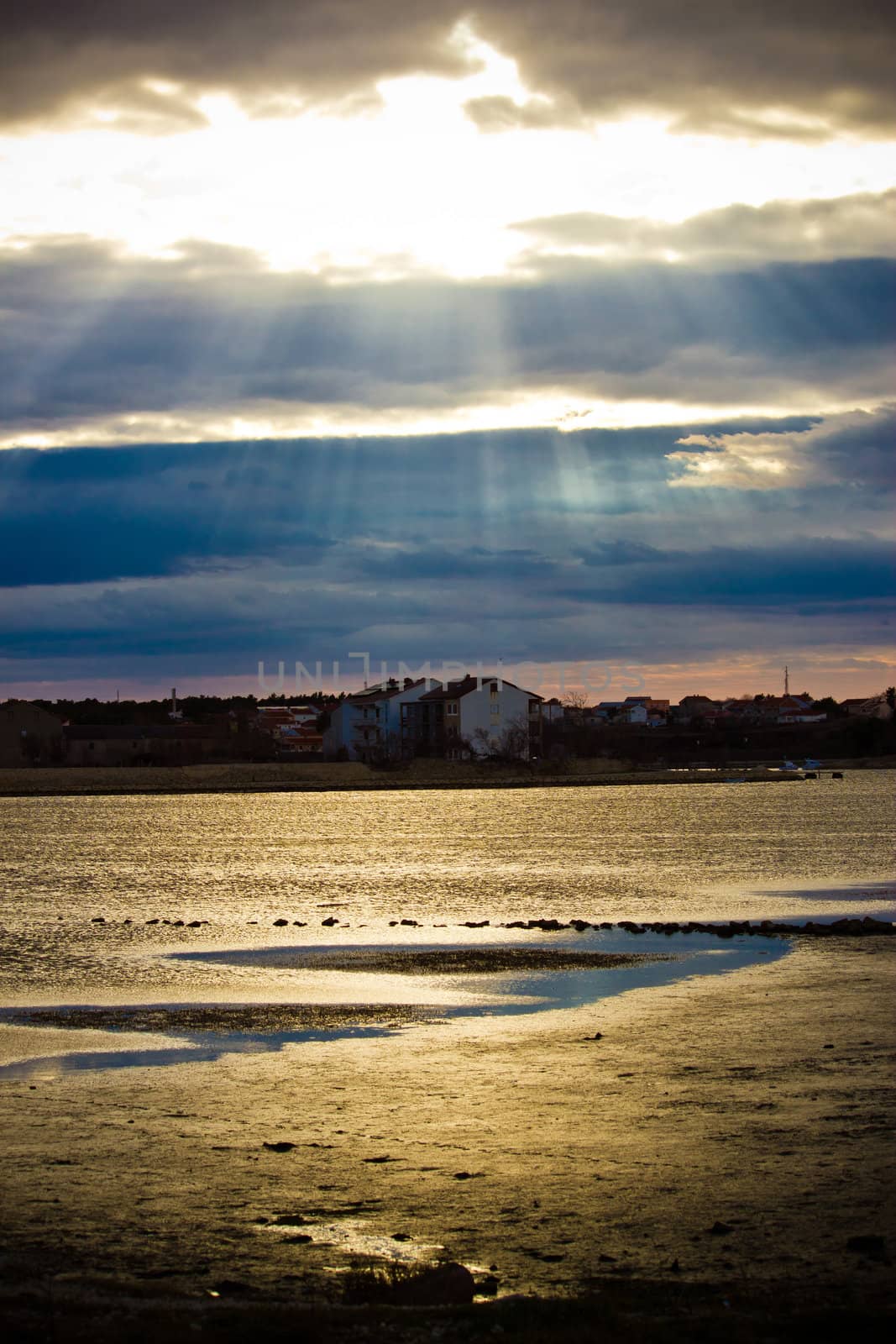 Sun beams through clouds in Town of Nin, Dalamatia, Croatia