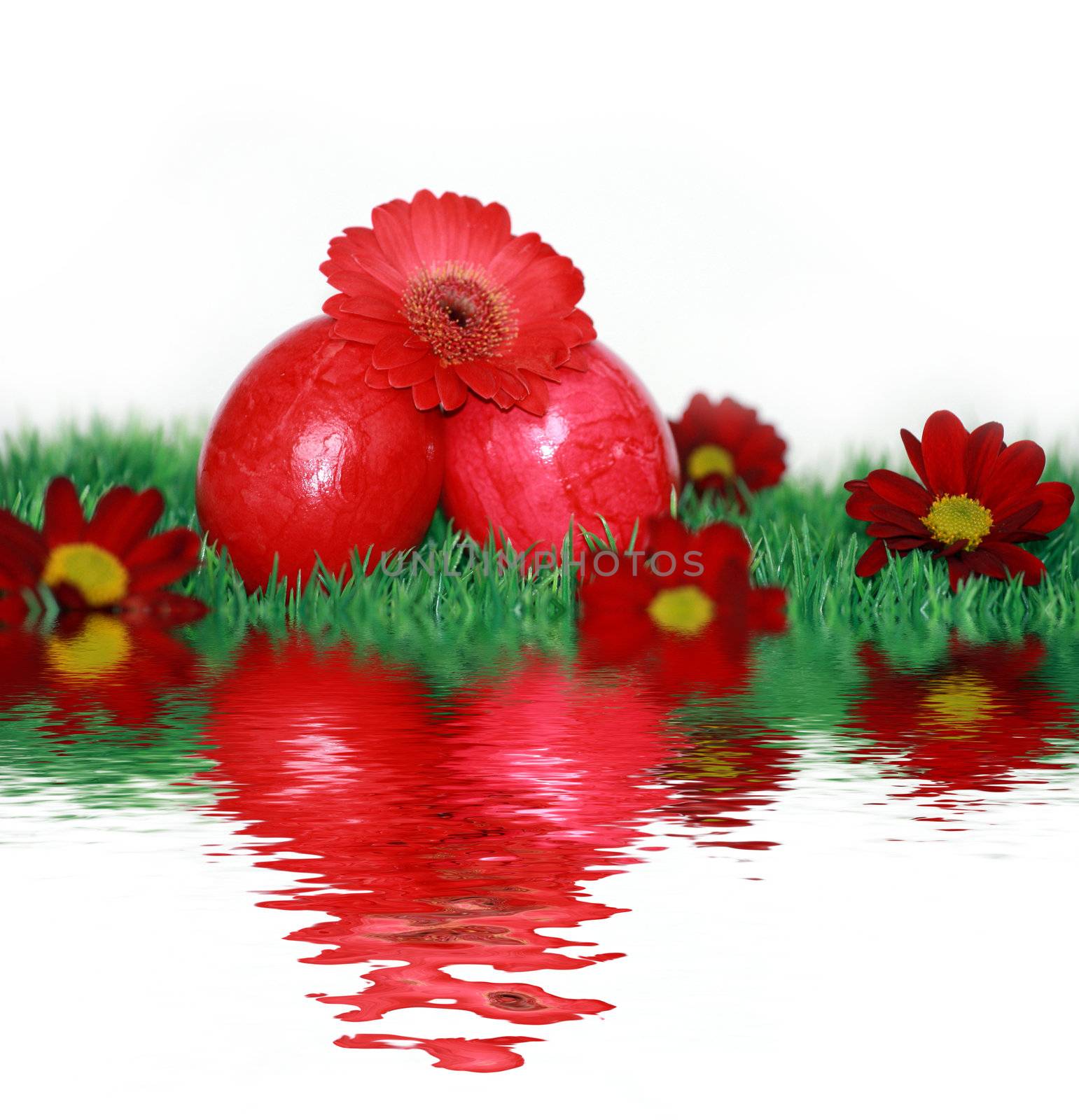 Red Easter eggs and red flowers by photochecker