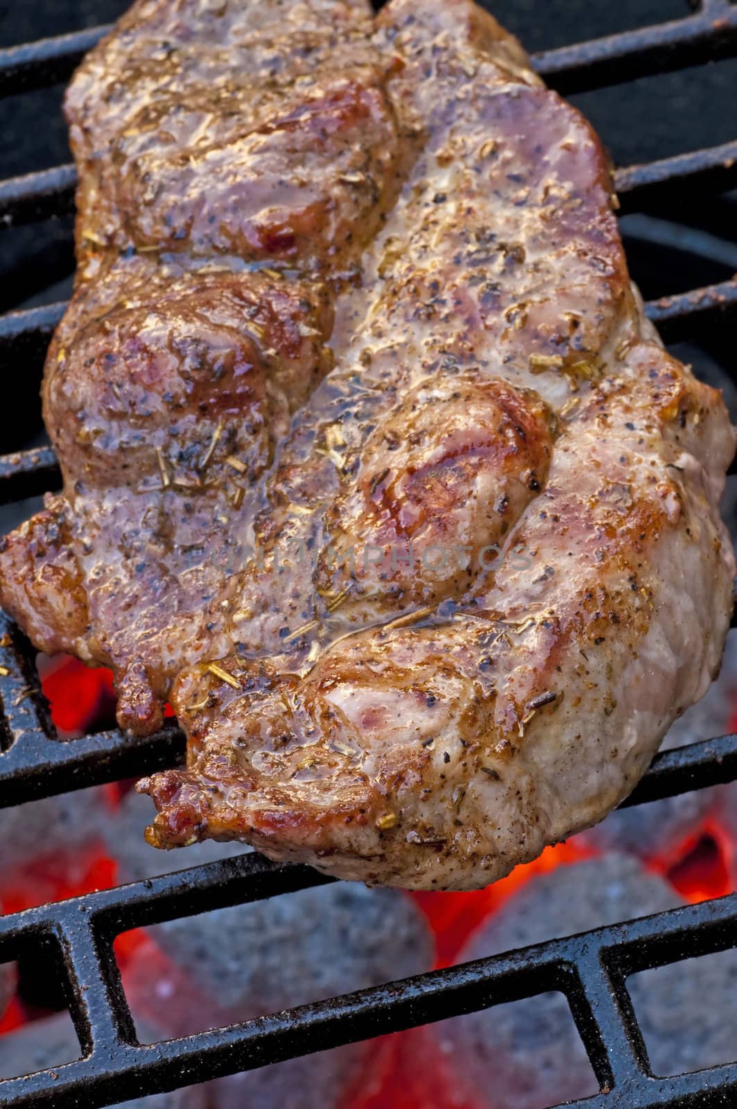 roasted pork neck on barbecue