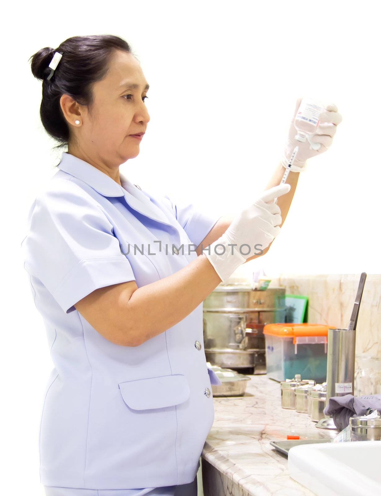 nurse holding syringe on white background.