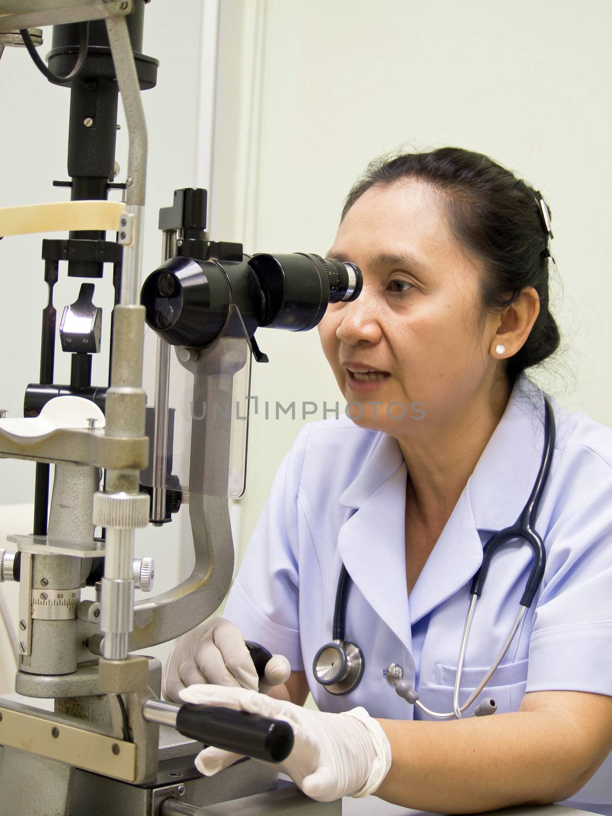 Nurse With Optometer