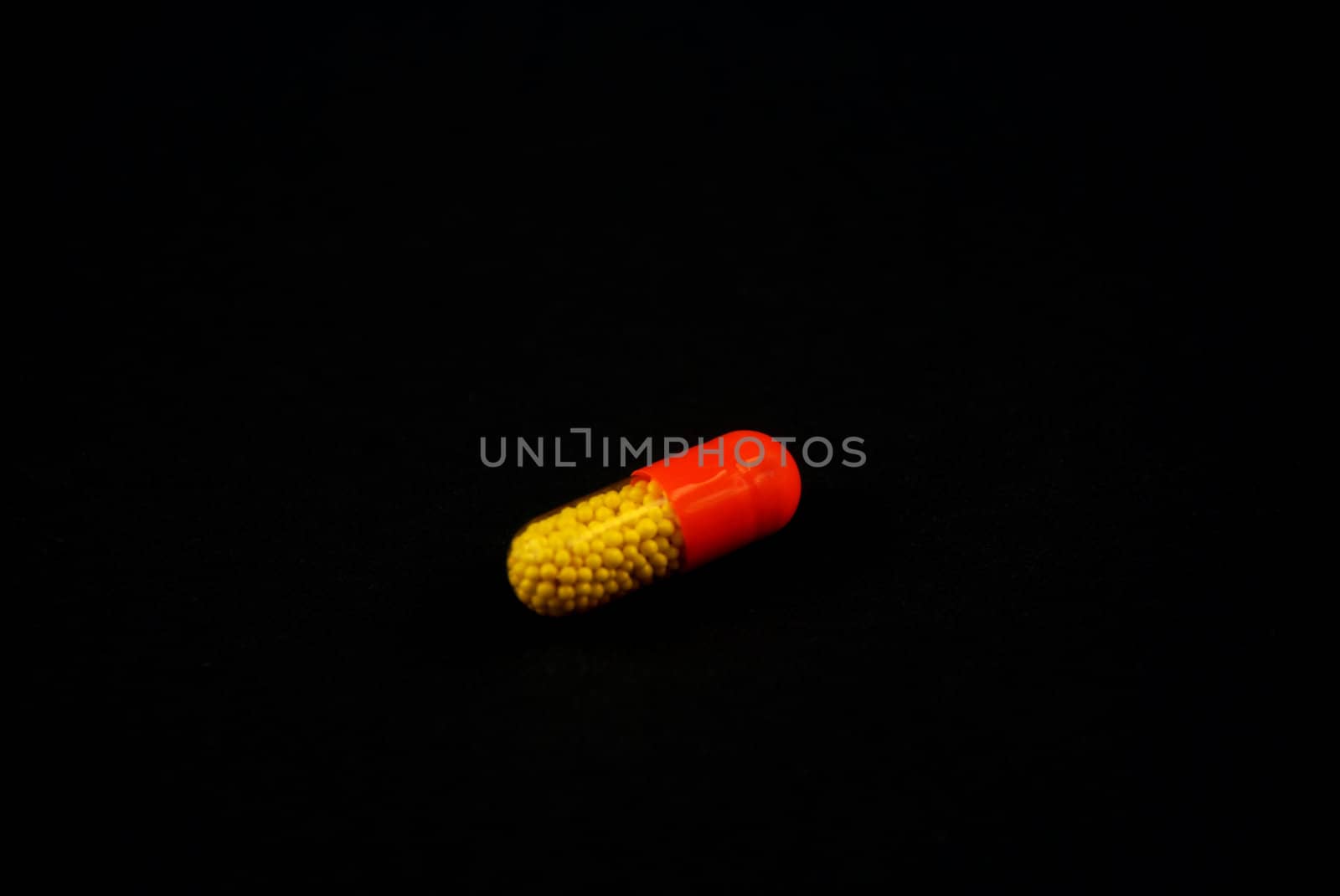 pictures of capsule pills showing the medicine inside it