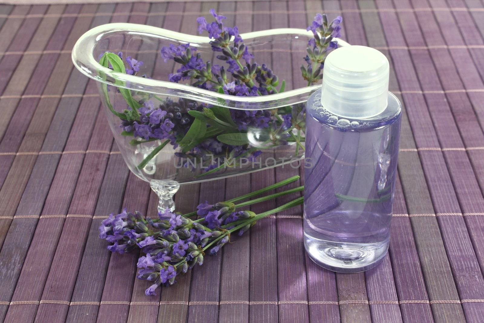 Lavender oil bath with flowers and leaves by discovery