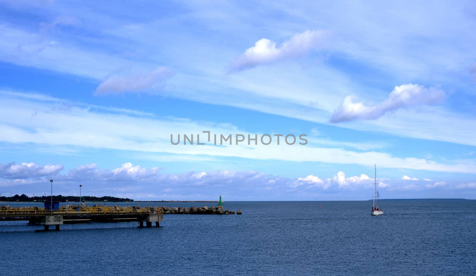 The sea on a background of the colourful sky