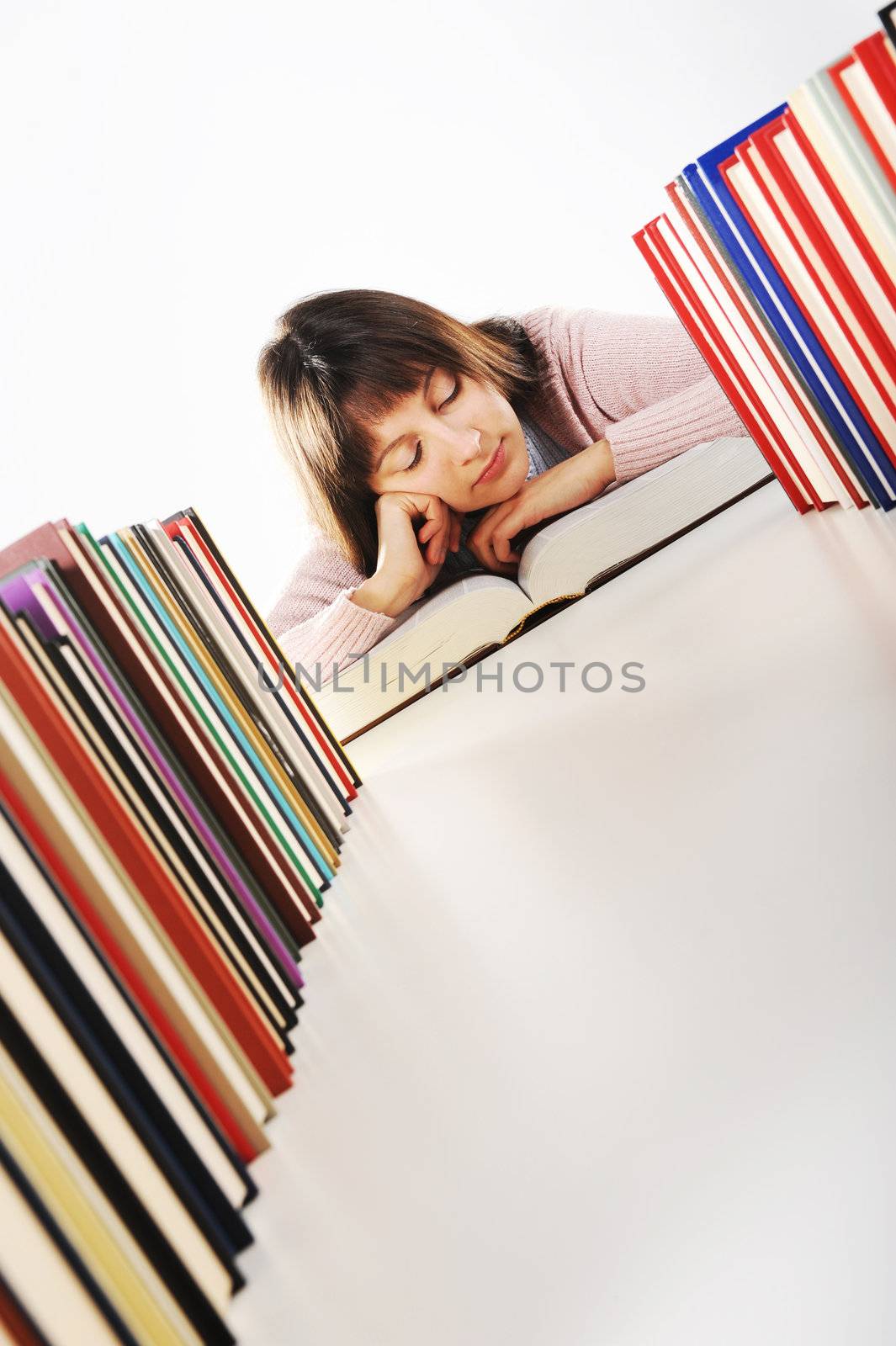 Female student reading a book, similar pictures on my portfolio by stokkete