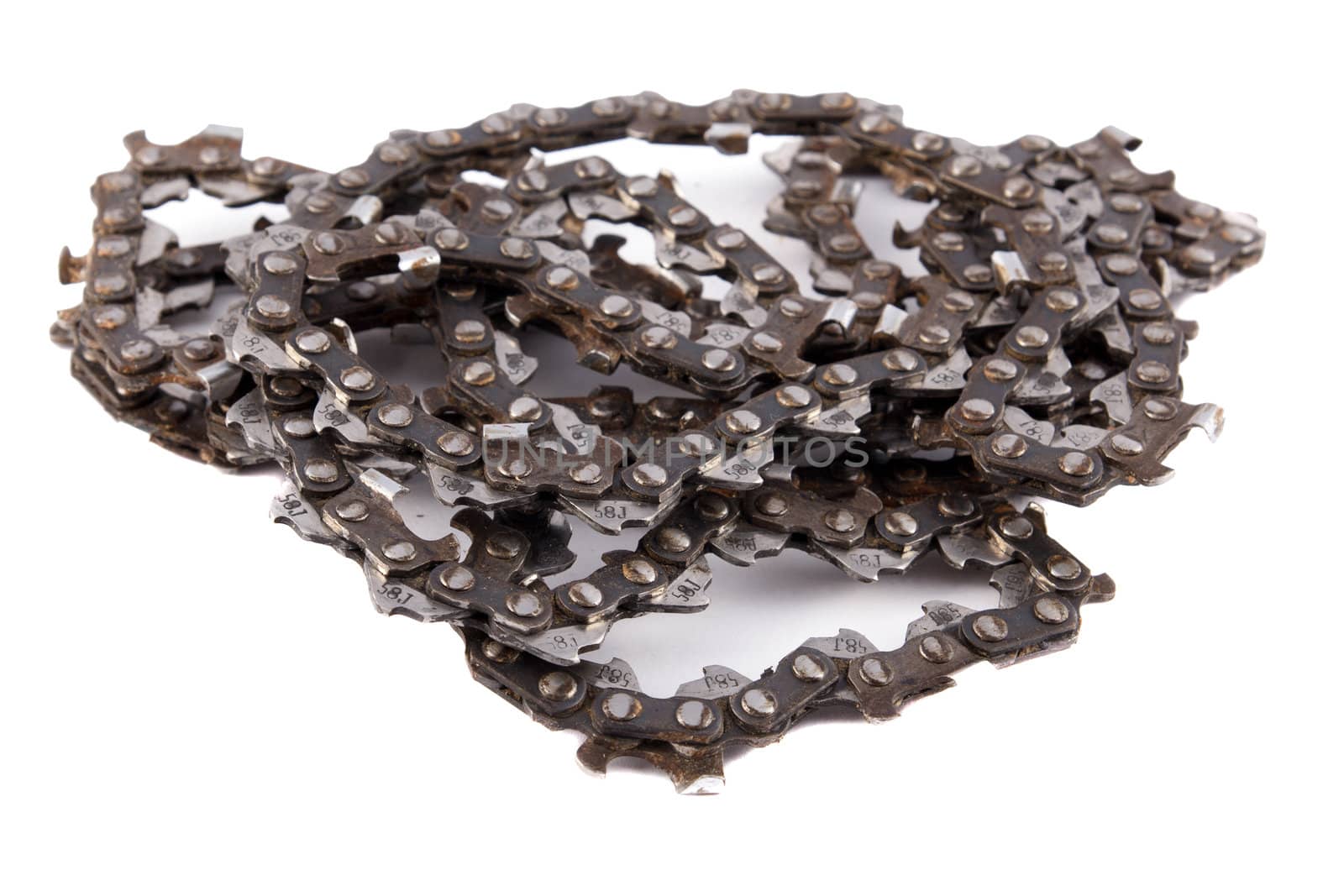 used chainsaw chain on a white background