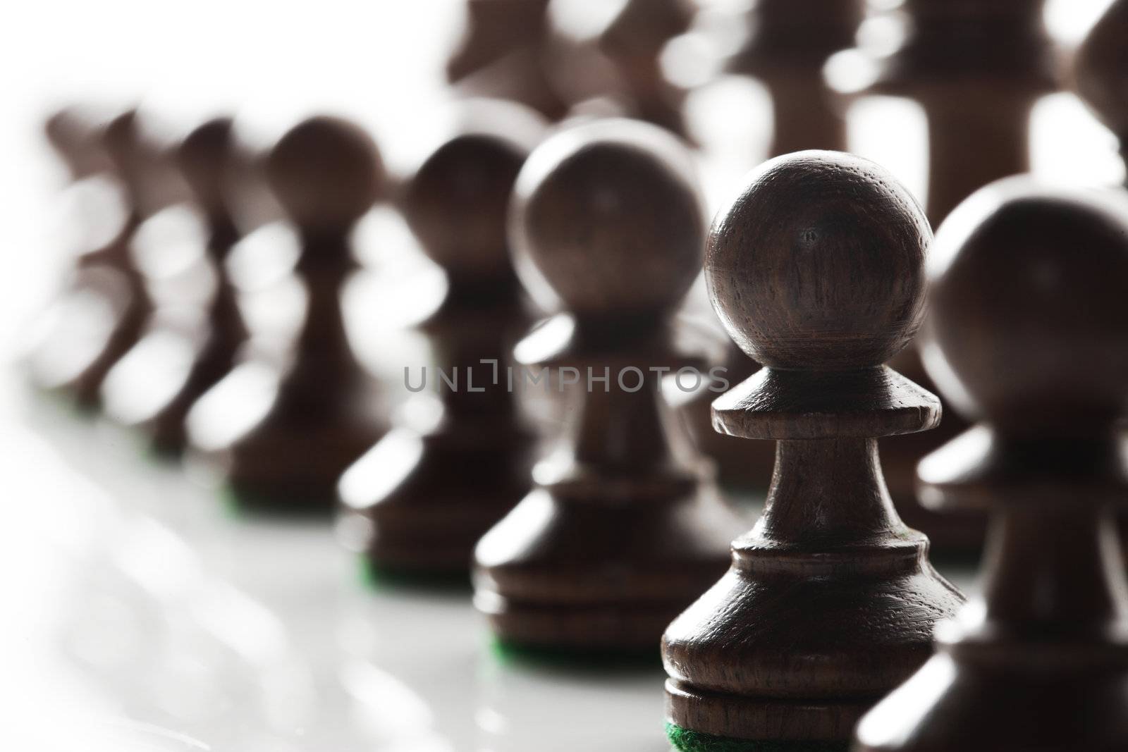 Chess pieces ready to do battle.