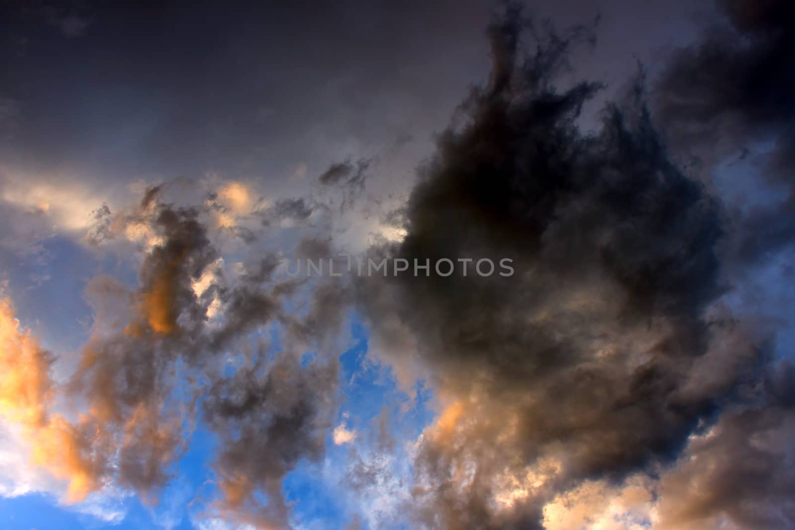 Clouds Illuminated at Sunset by Wirepec