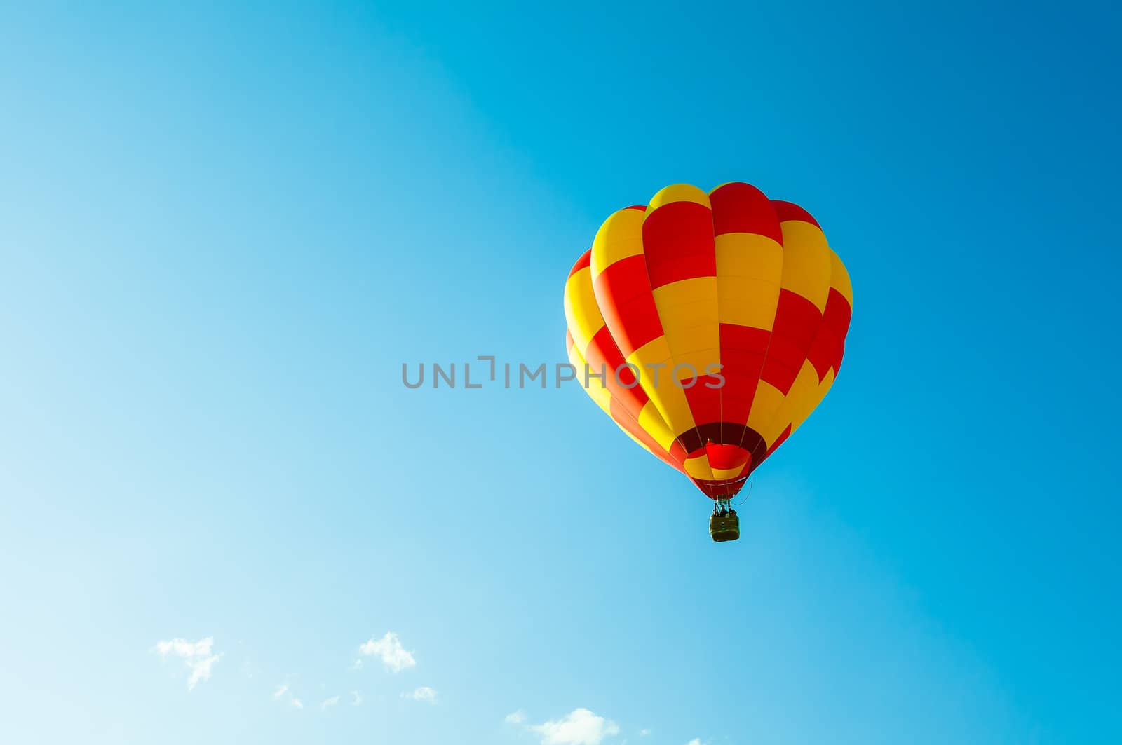 Two tone balllon in blue sky and little cloud
