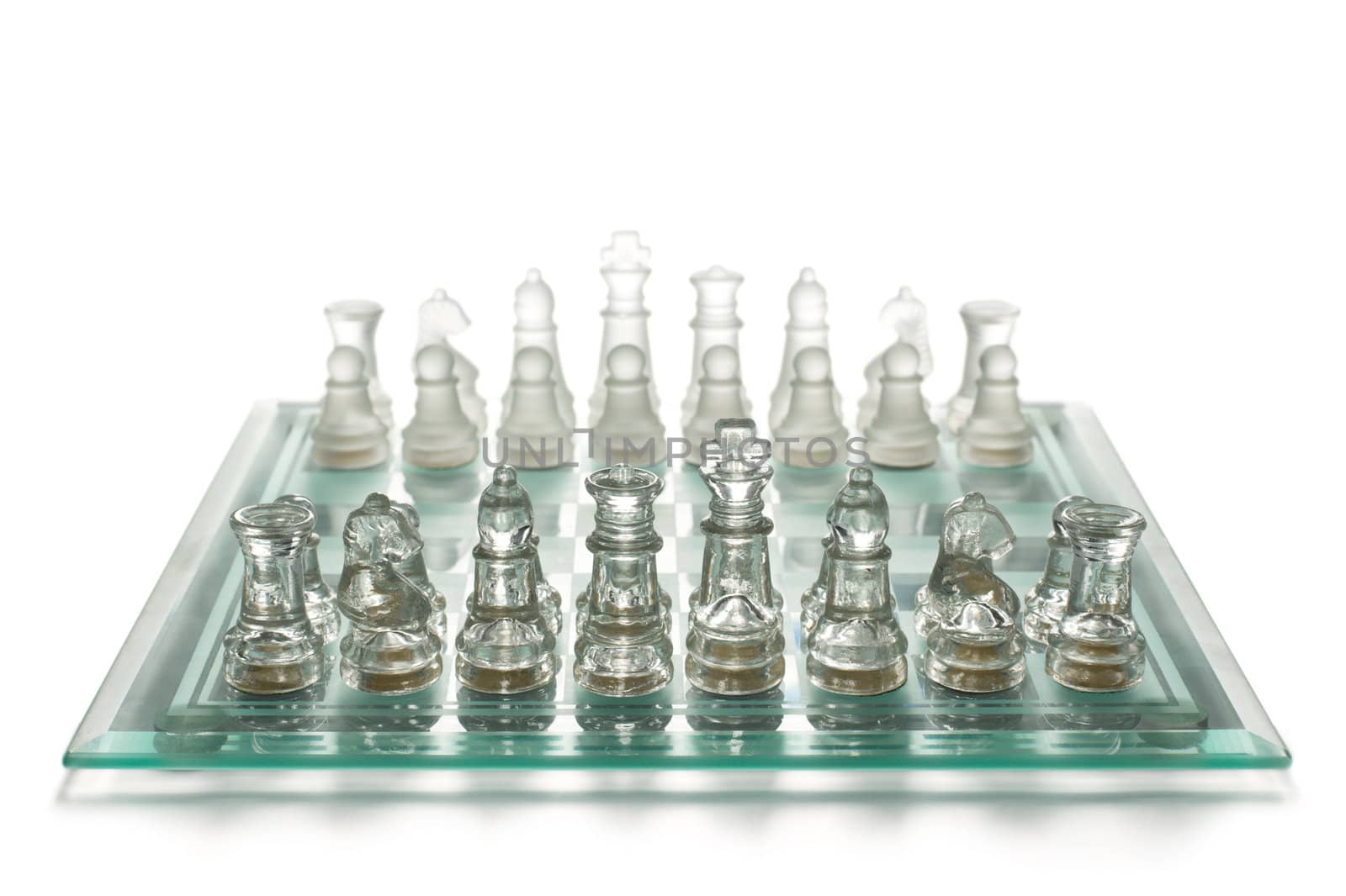 Glass chess on chess board