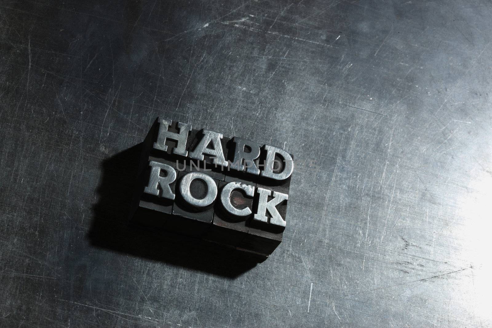 metal HARD ROCK background :  antique metal letter-press type. by stokkete