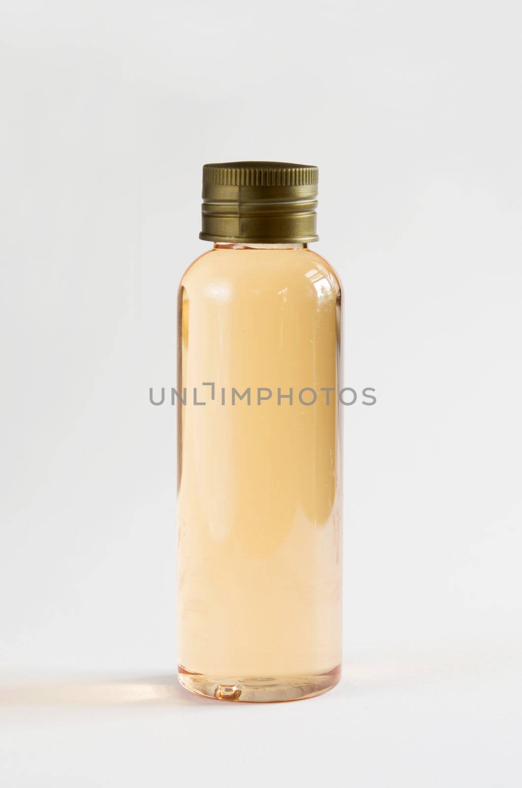 close up of a bottle on white background