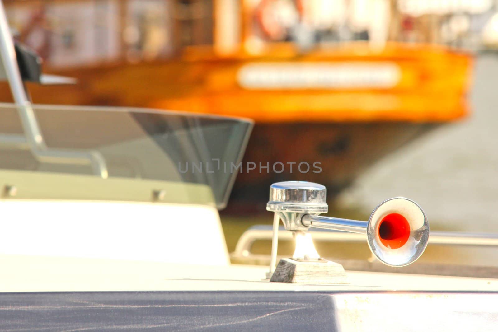 Fog horn mounted onto a boat, in harbor by Arvebettum