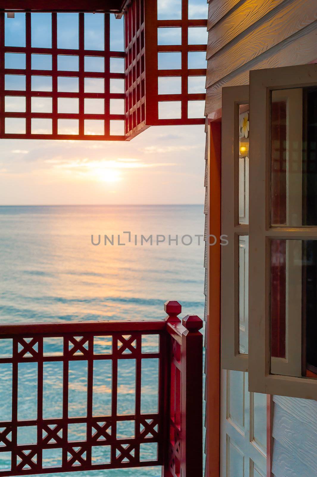Sunrise in the sea with windows terrace view  by moggara12