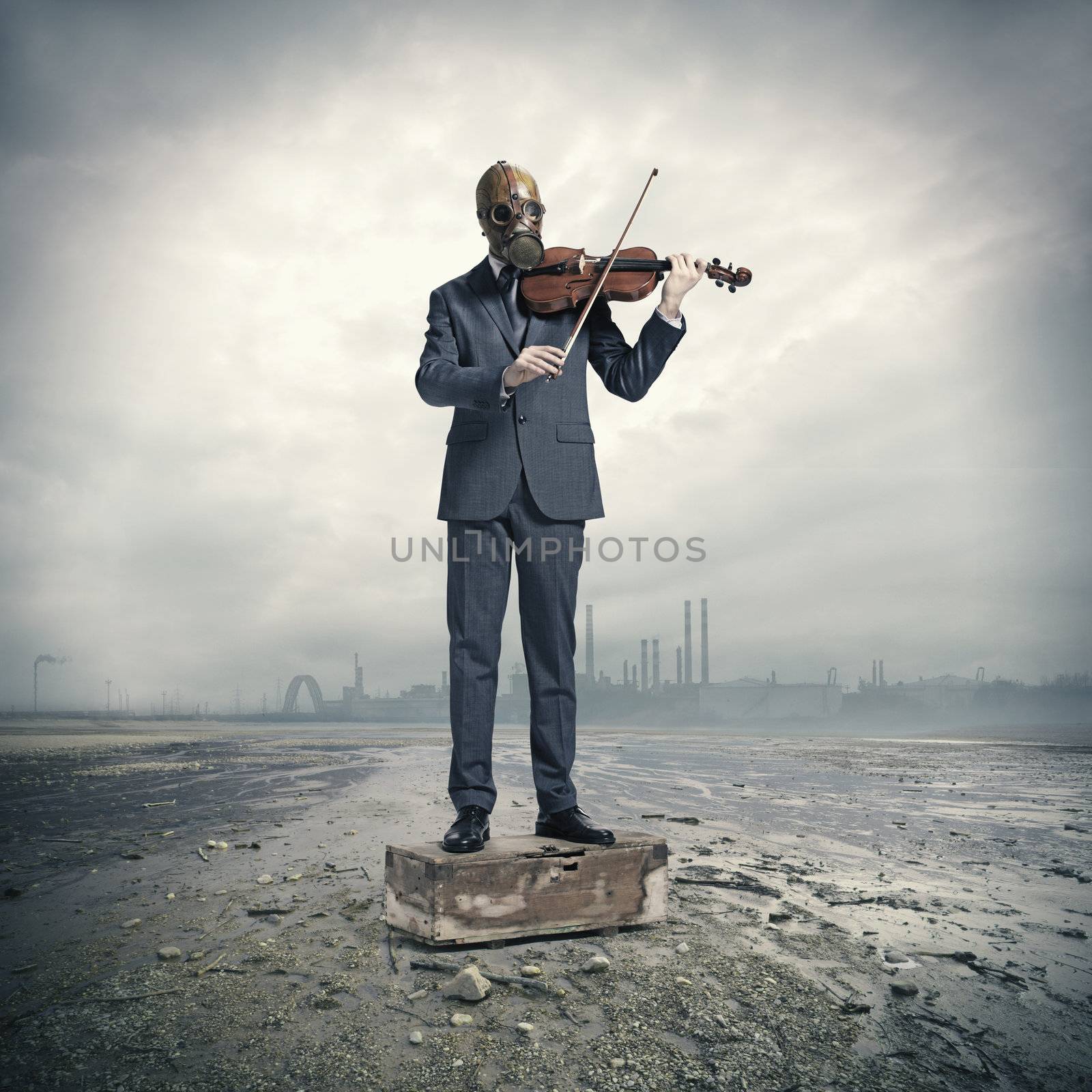 businessman with gas mask, plays the violin