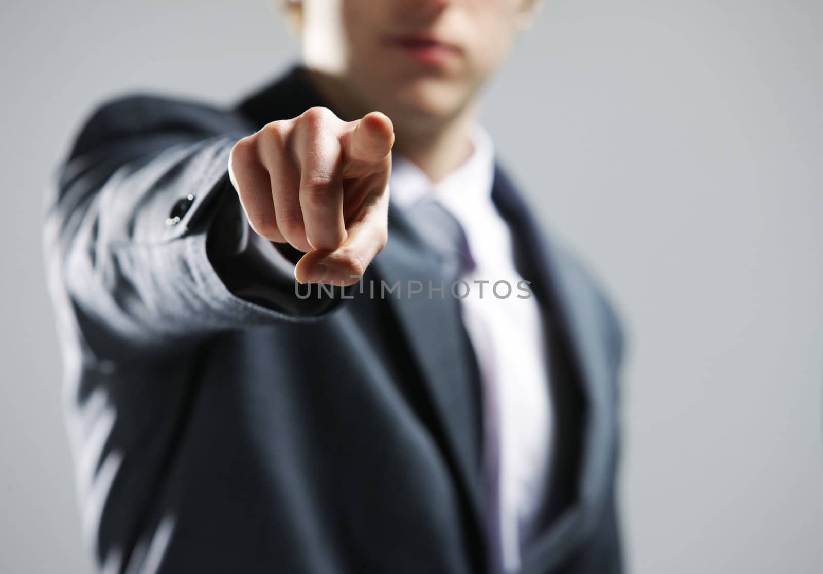 businessman  hand pointing out at you by stokkete