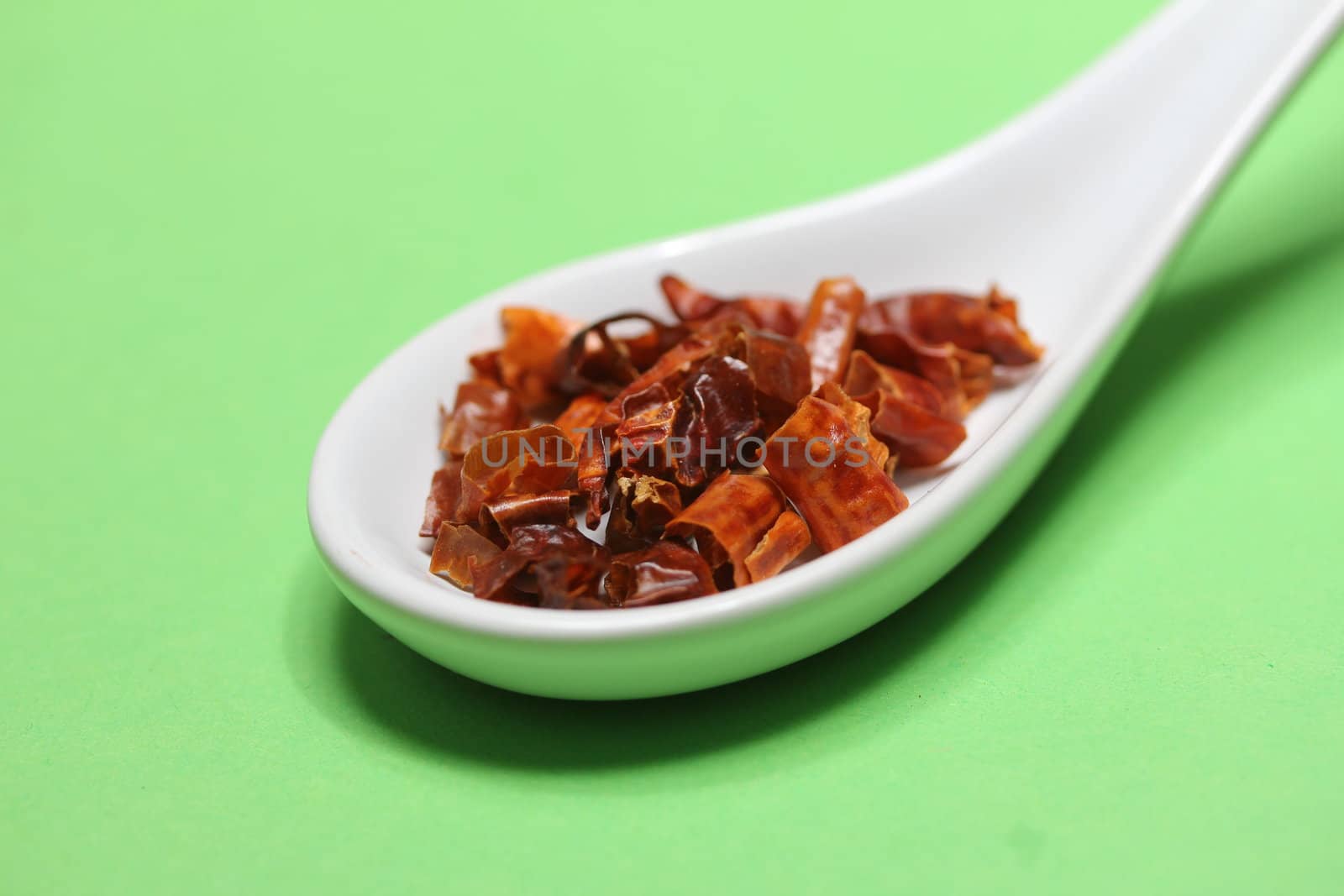 hot chili plant pieces on a spoon