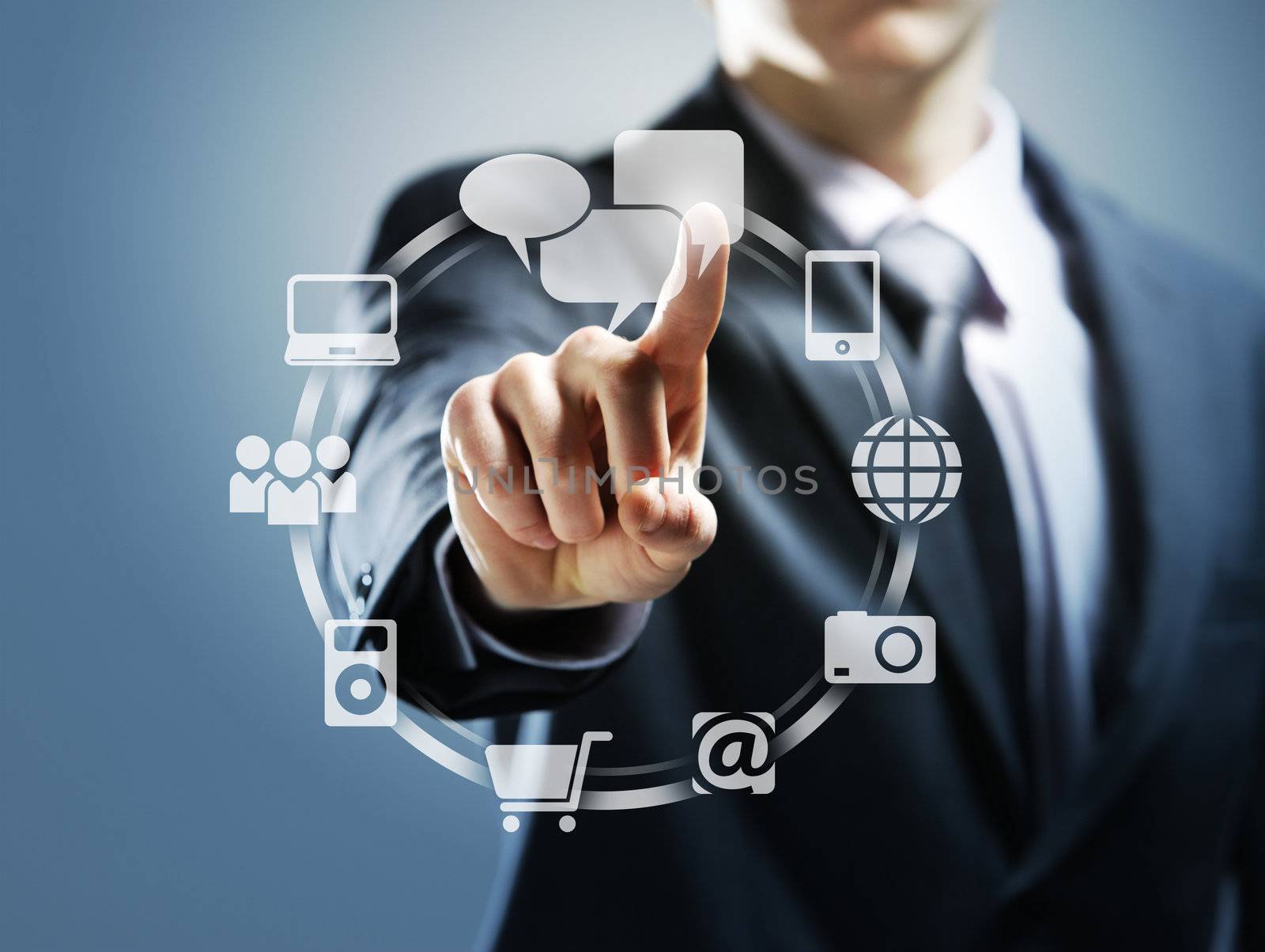 Businessman pressing virtual icons