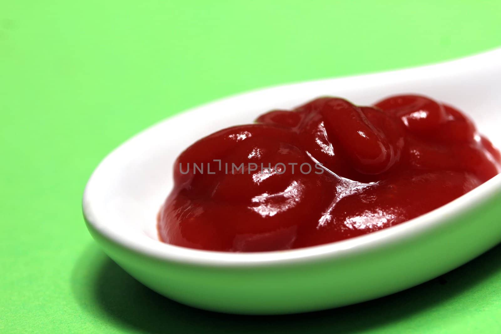 ketchup on a porcelain spoon
