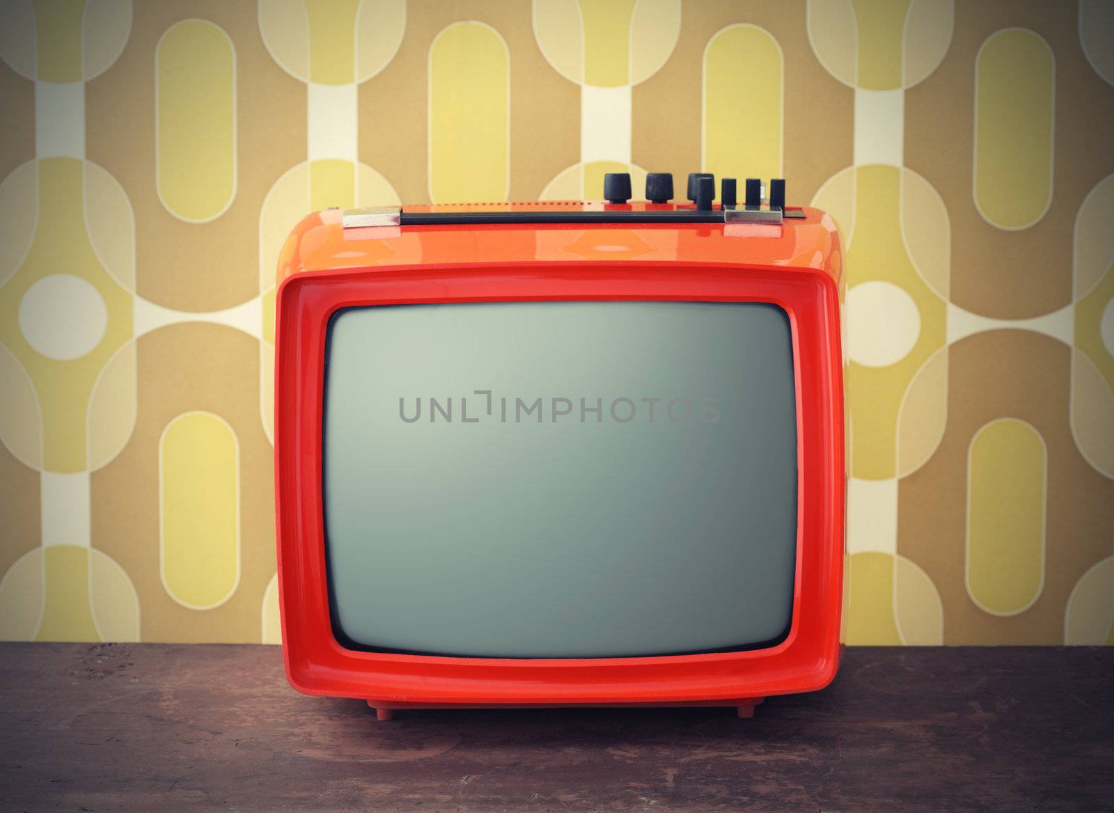 Old TV on vintage background