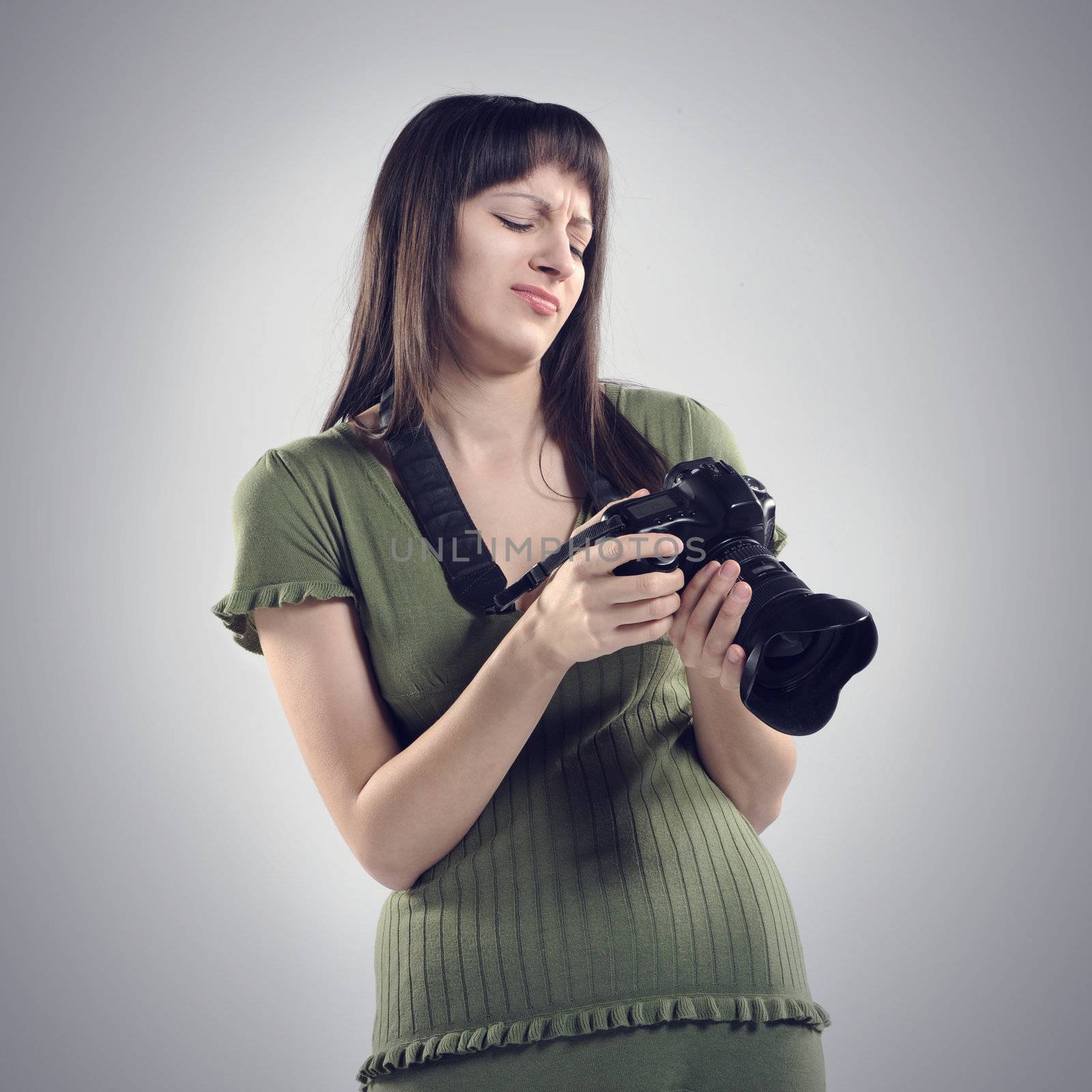 bad photo: photographer holds up a camera. by stokkete