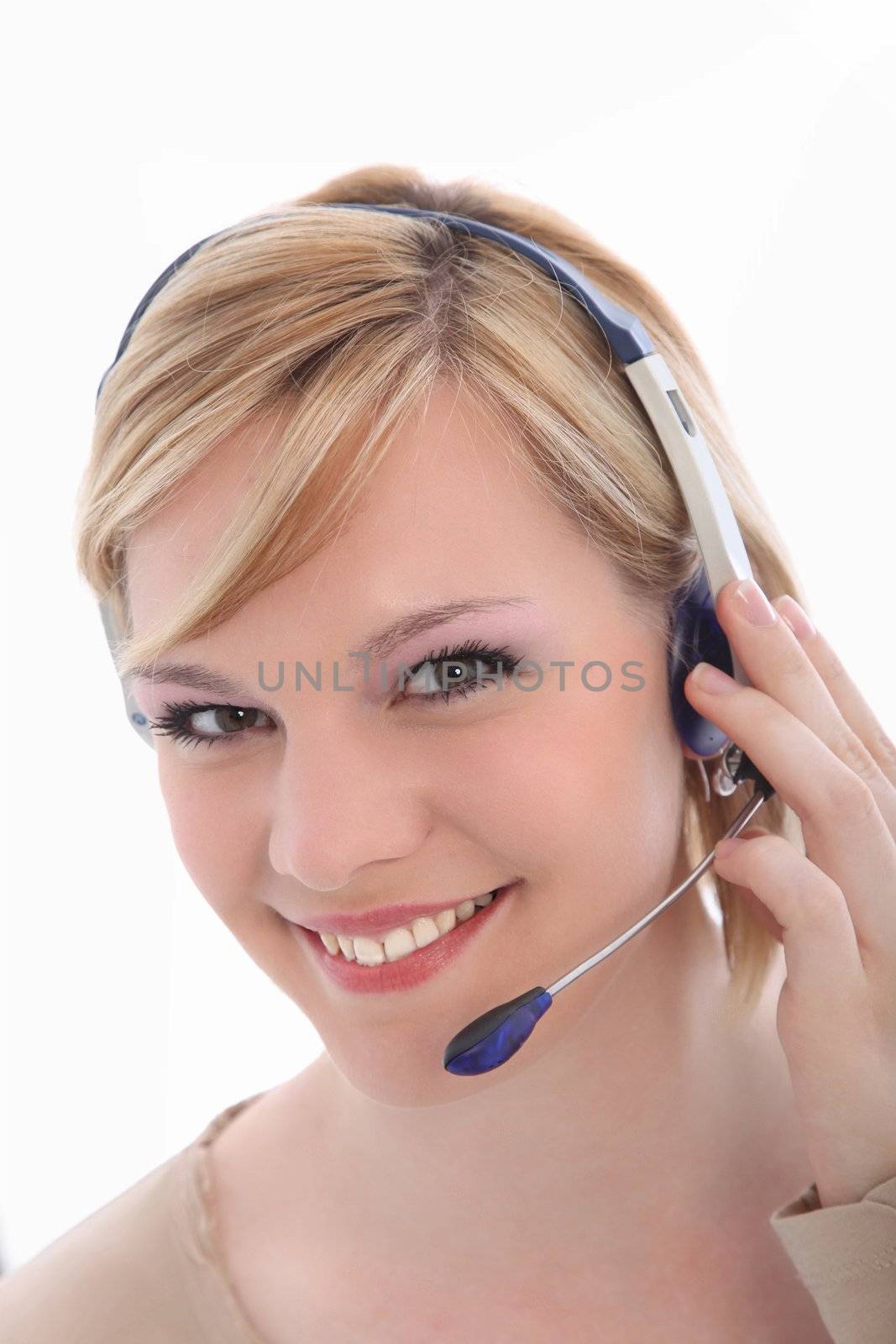 Portrait of smiling call center employee on white background