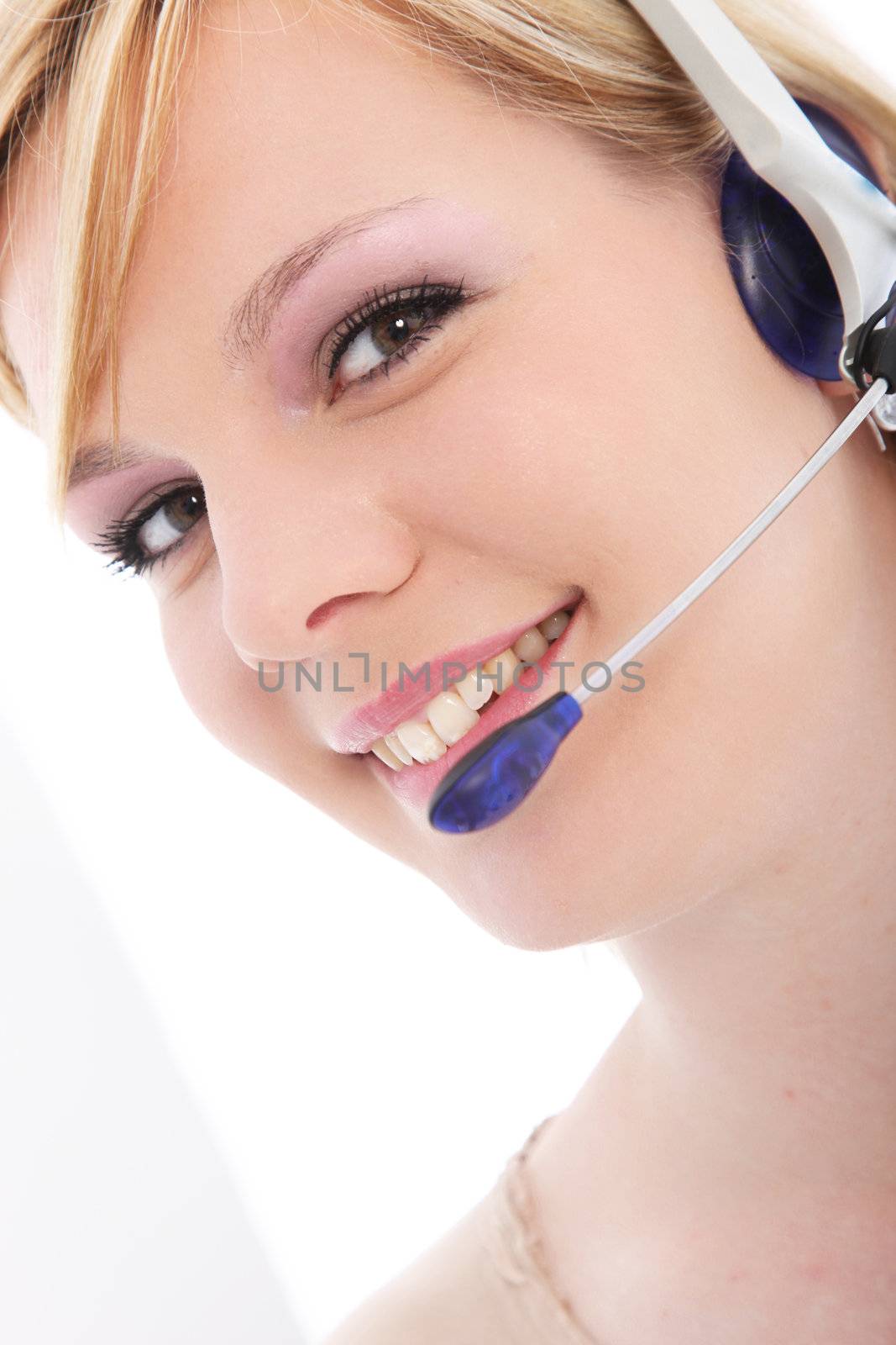 Close up portrait of attractive female call center employee with headset