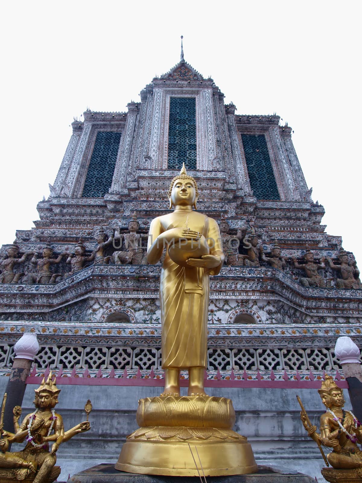 Budha statue stand front of ancient big pagoda in Wat Arun Temple place in Bangkok , Thailand