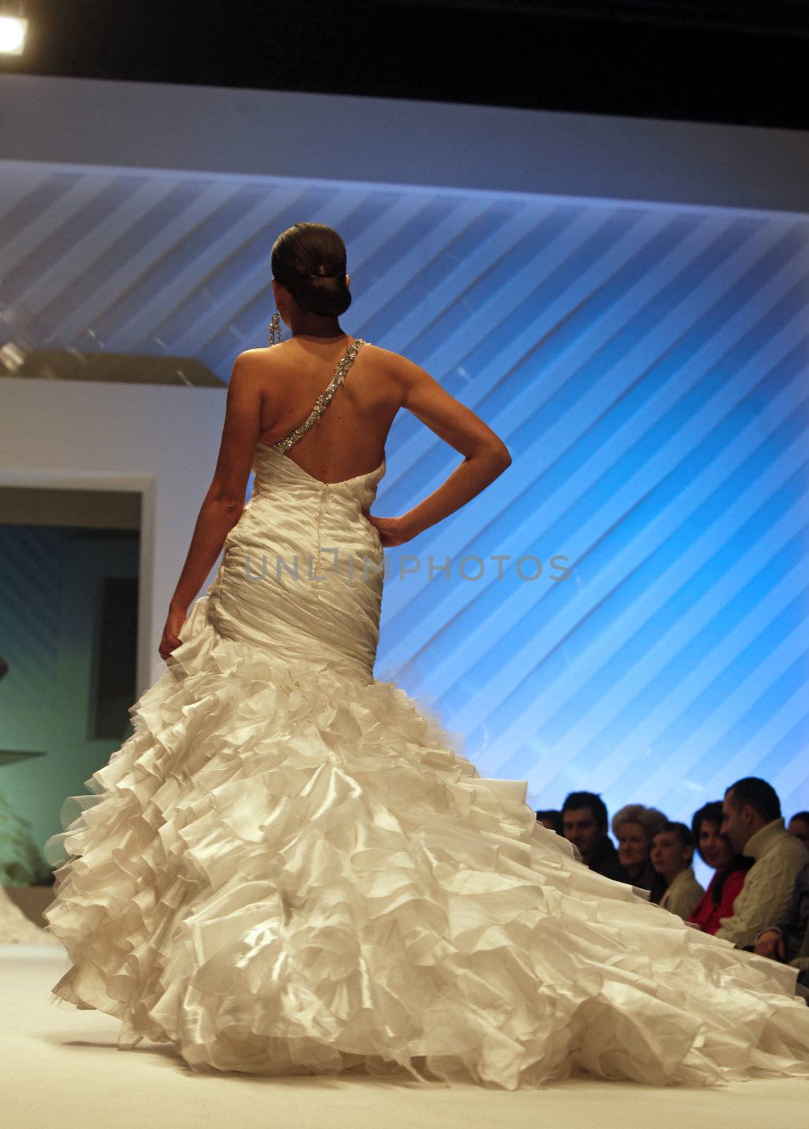 ZAGREB, CROATIA - FEBRUARY 19: Fashion model walks the runway in wedding dress on 'Wedding days' show, February 19, 2012 in Zagreb, Croatia.