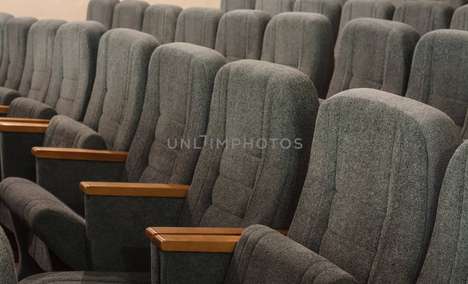 Red velvet armchairs in the hall