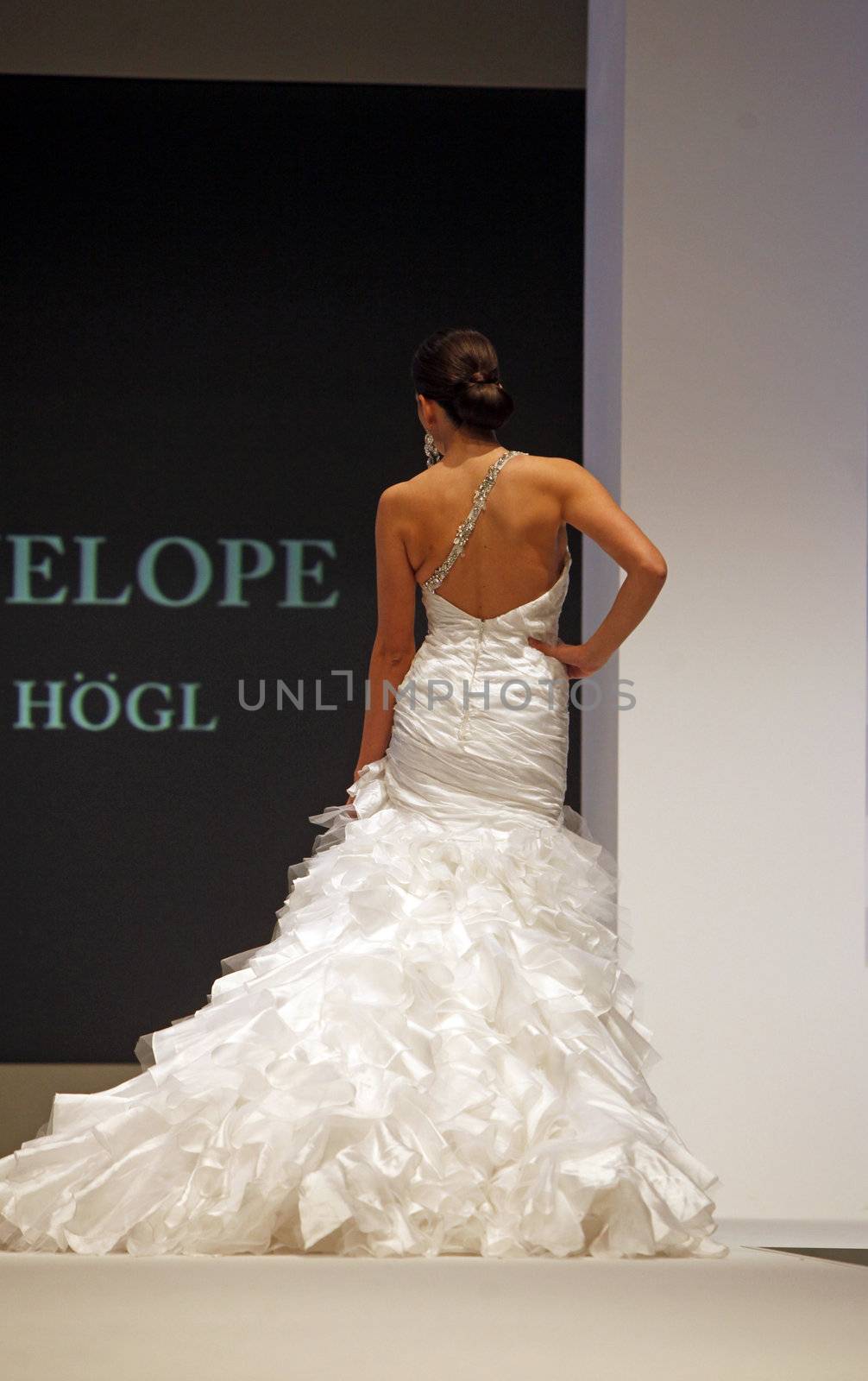 ZAGREB, CROATIA - FEBRUARY 19: Fashion model walks the runway in wedding dress on 'Wedding days' show, February 19, 2012 in Zagreb, Croatia.