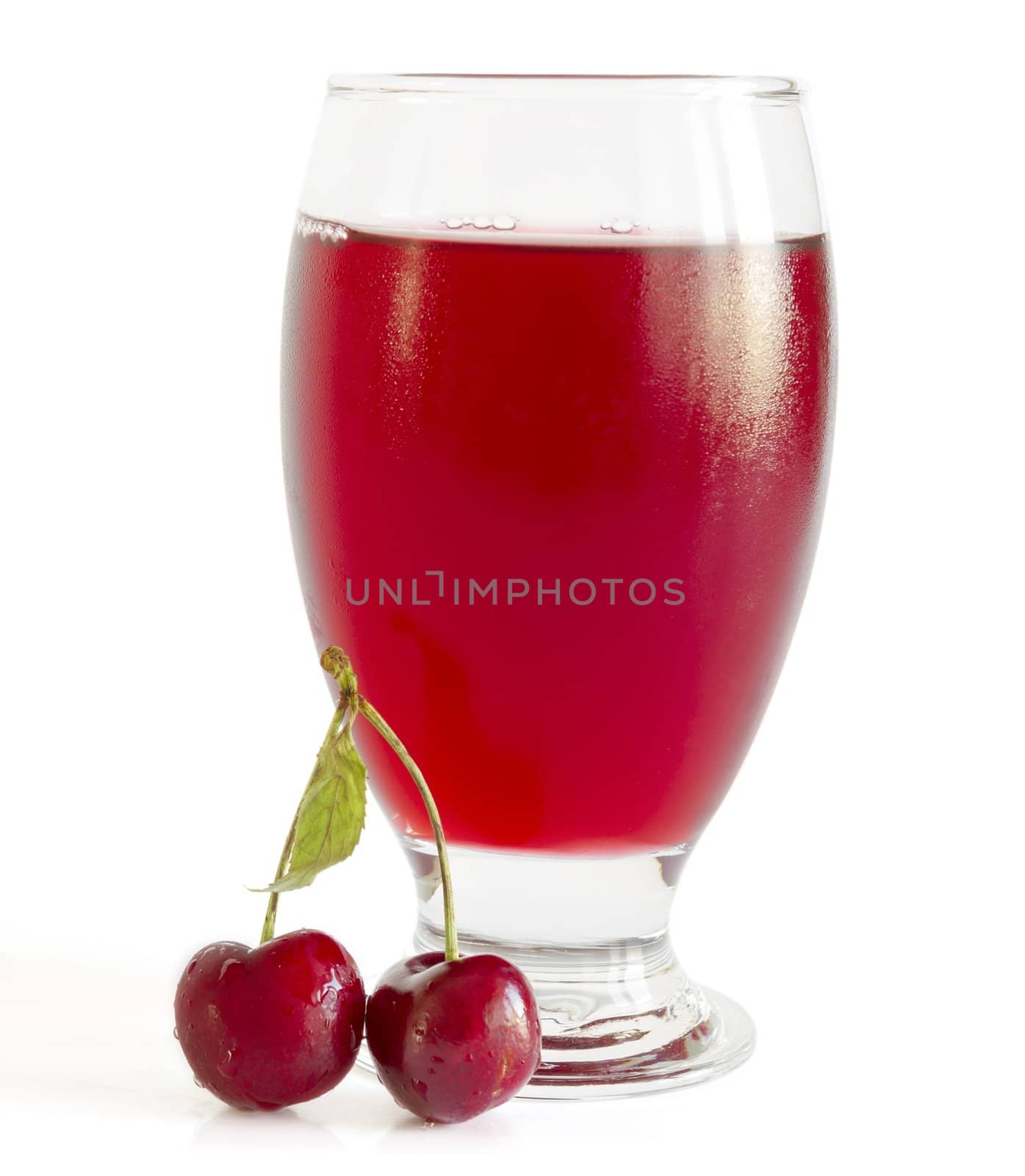 Fresh cold drink with cherry against white background