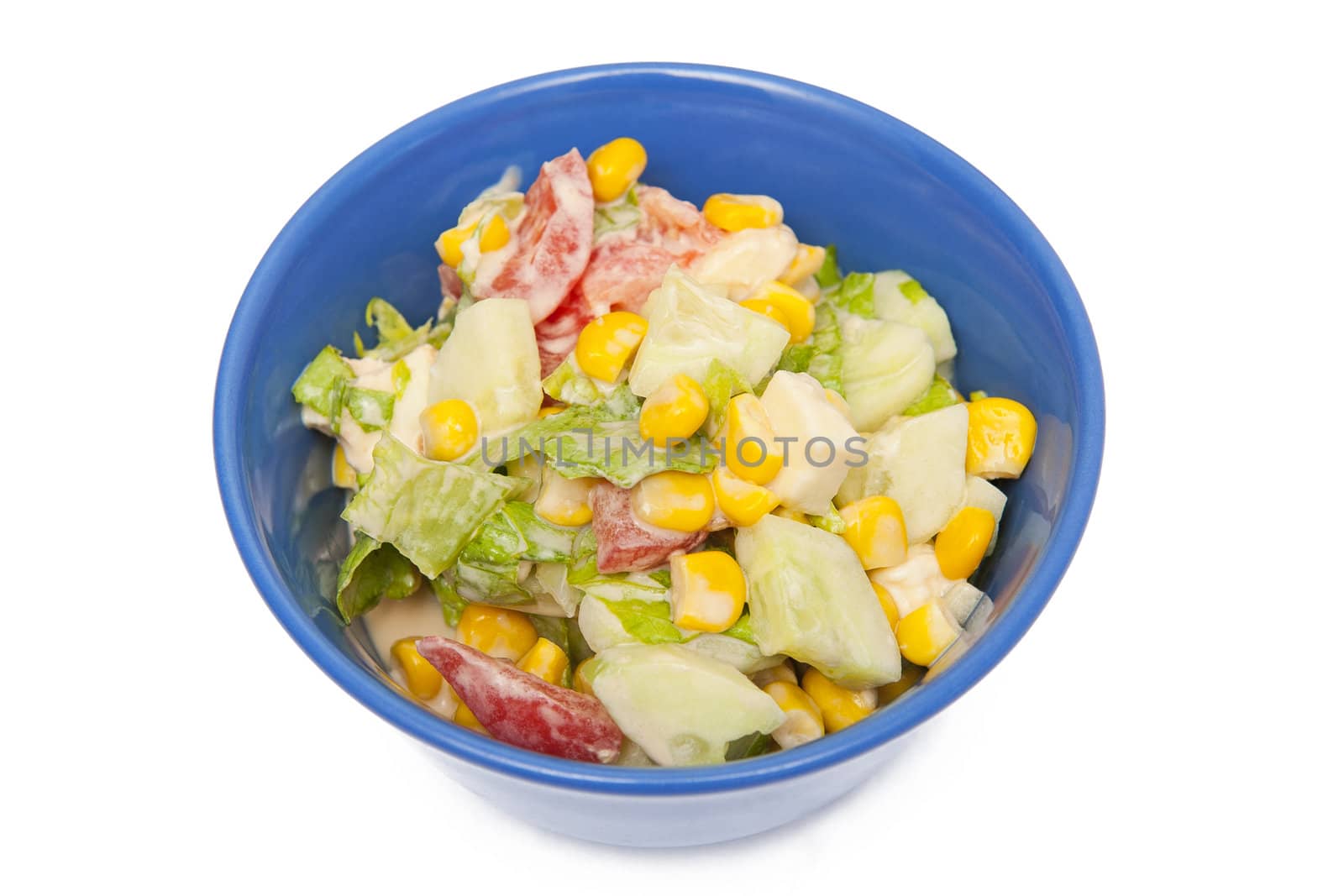 Colorful salad in the blue bowl