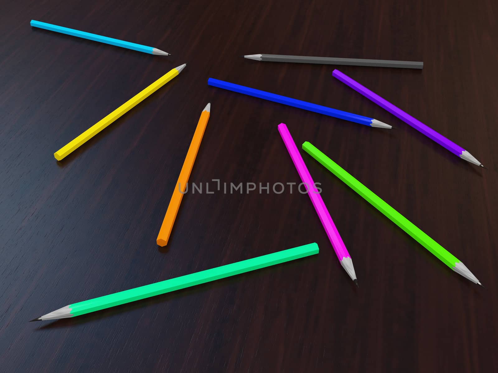 The colored pencils on a wooden table