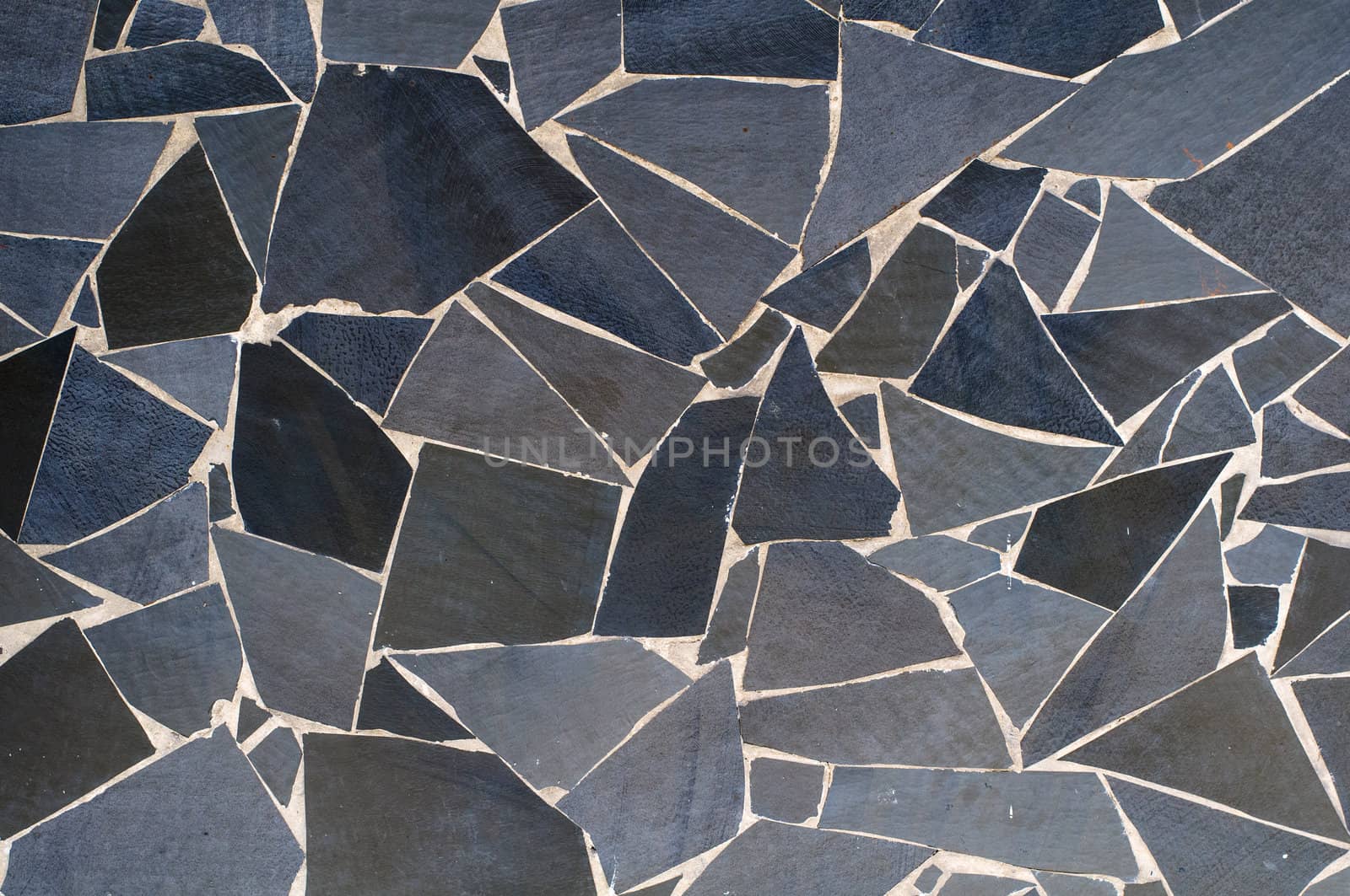 Mosaic stone wall texture. High resolution background