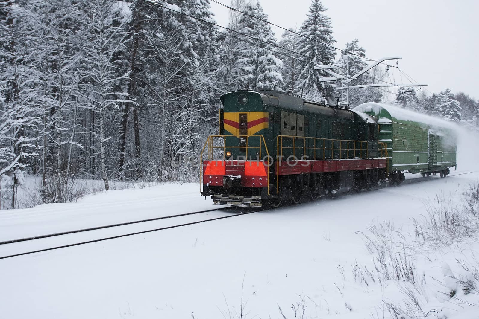 Small train moving in winter