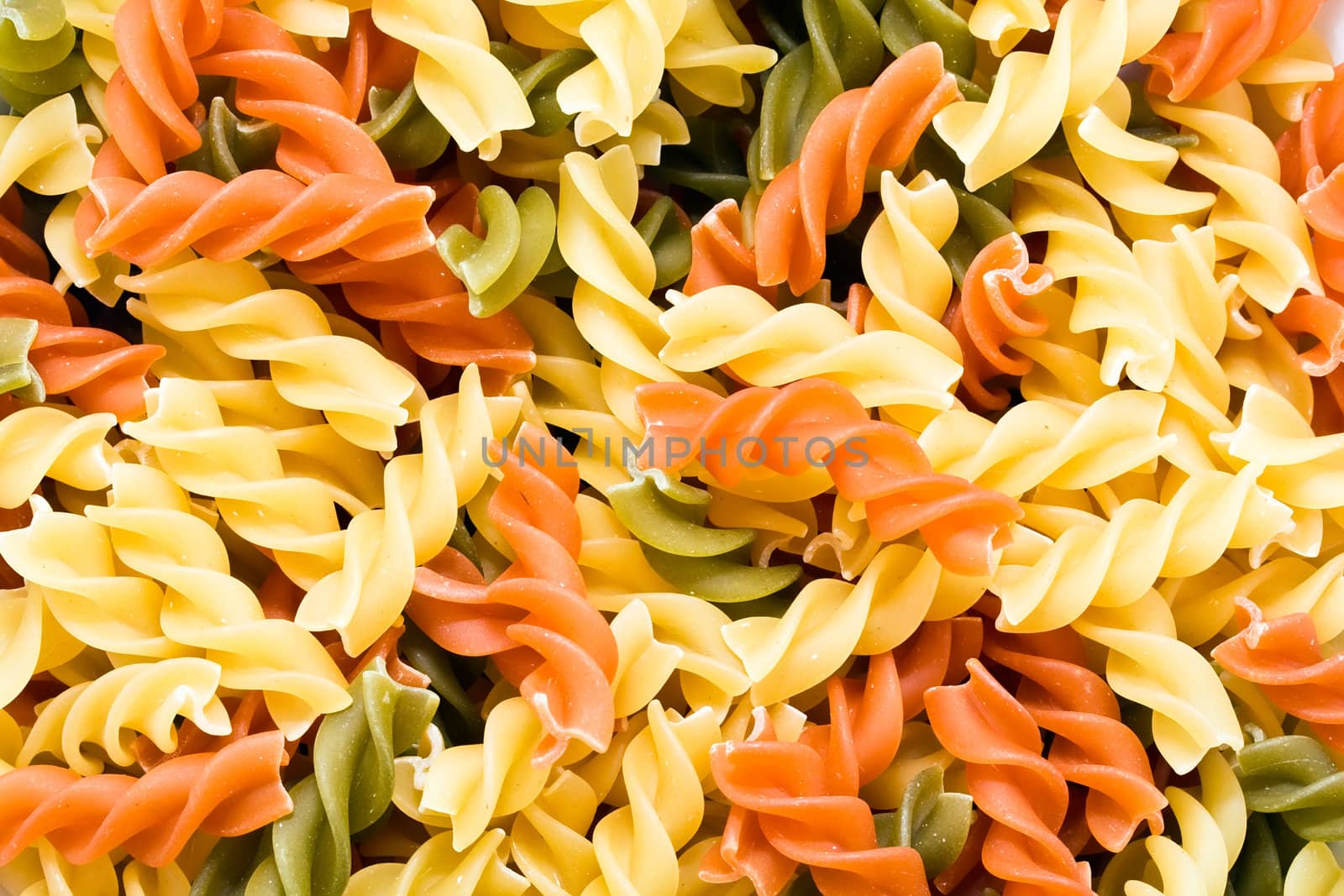 Raw italian pasta isolated on white background