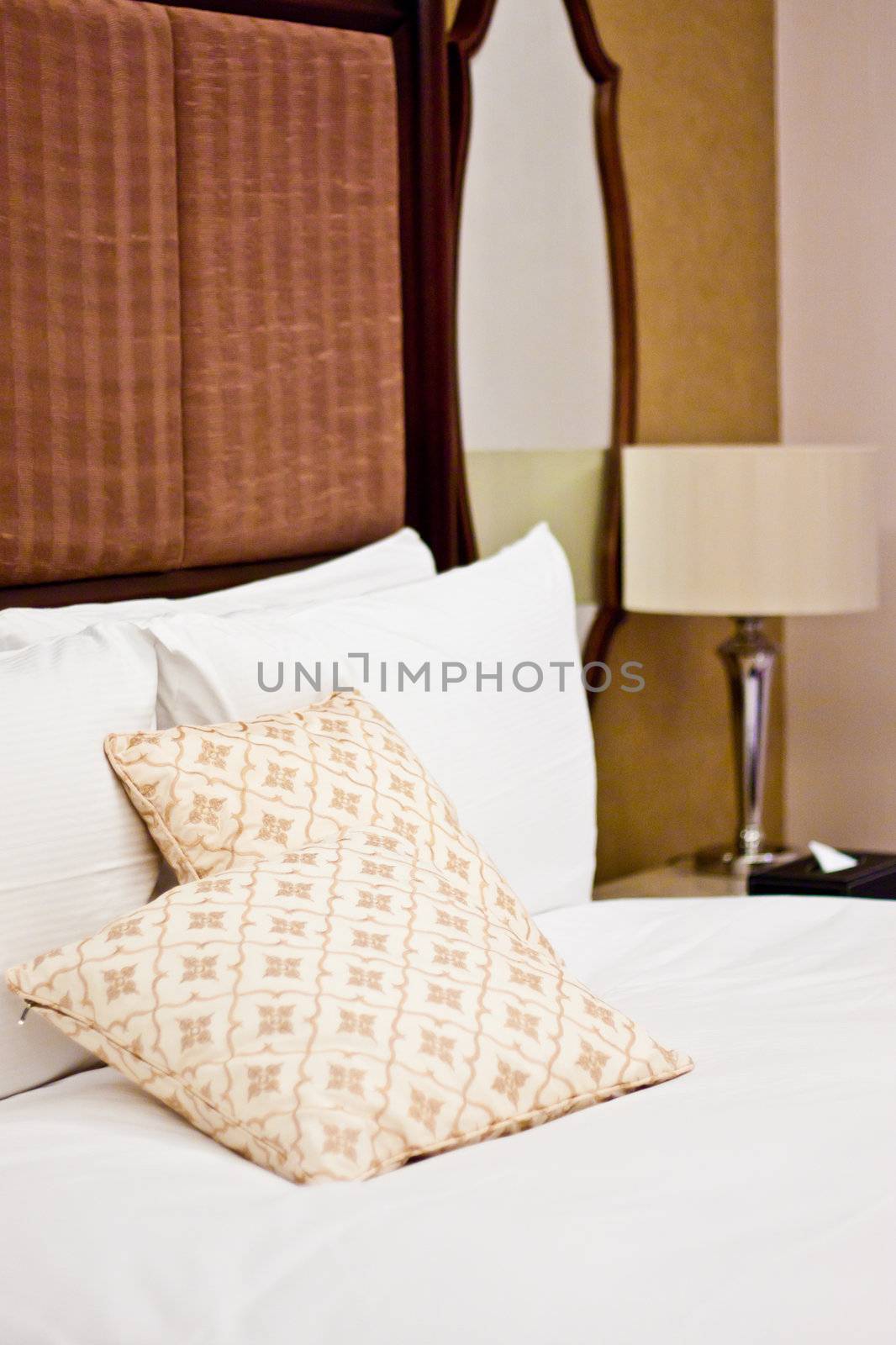 Pillows in Hotel bedroom by Perseomedusa