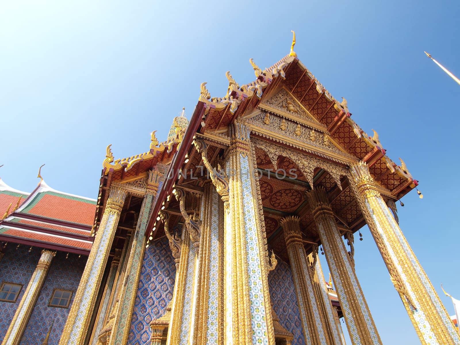 Golden pagoda in Grand Palace ,Bangkok Thailand by jakgree