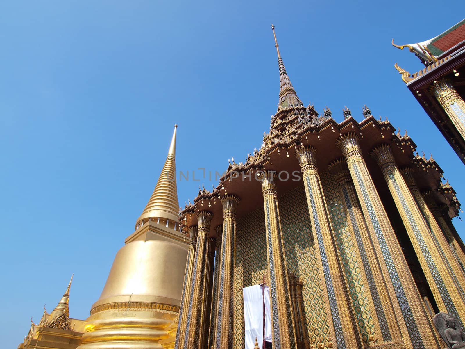 Golden pagoda in Grand Palace ,Bangkok Thailand by jakgree
