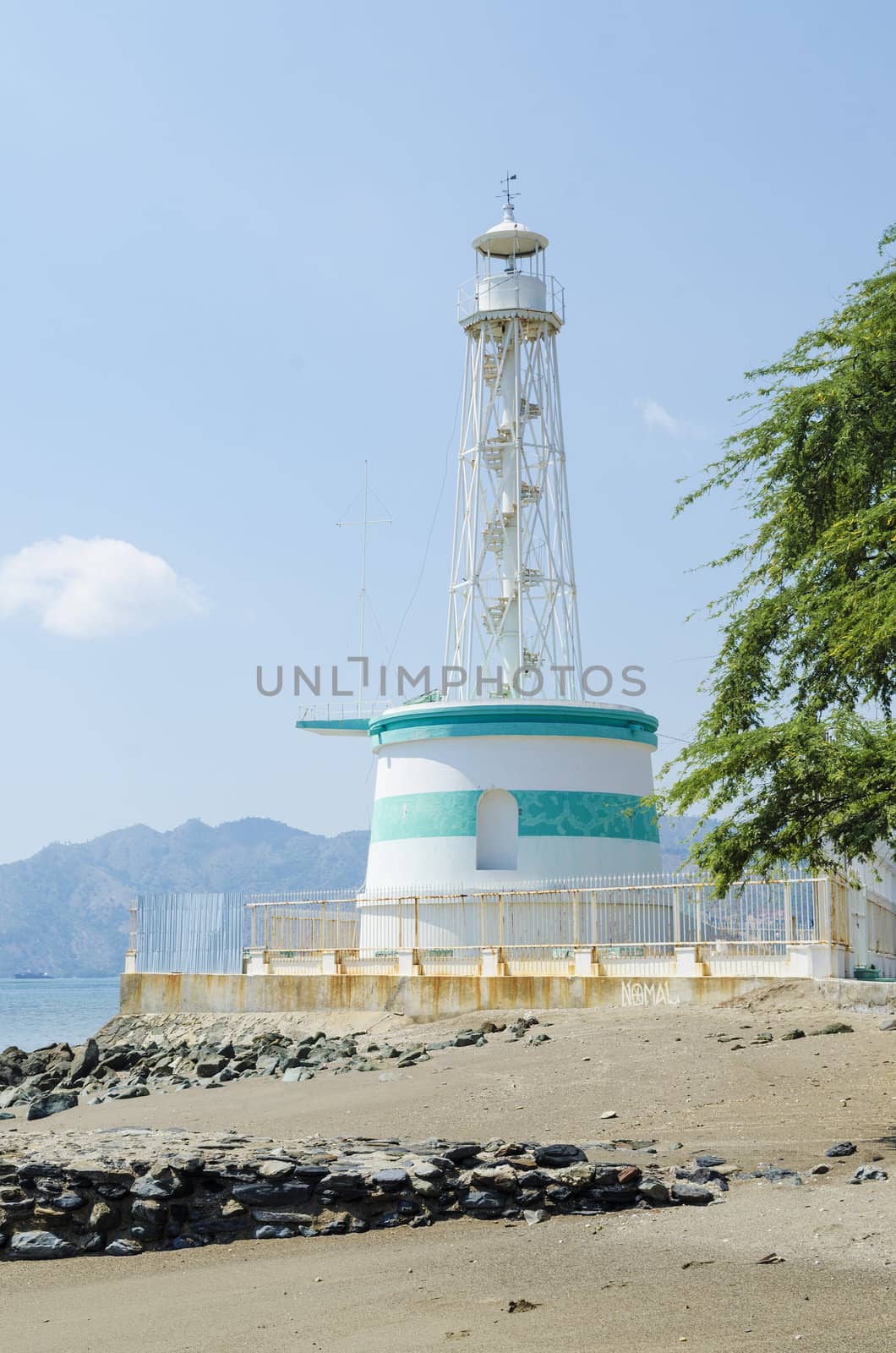 lighthouse in dili east timor, timor leste by jackmalipan