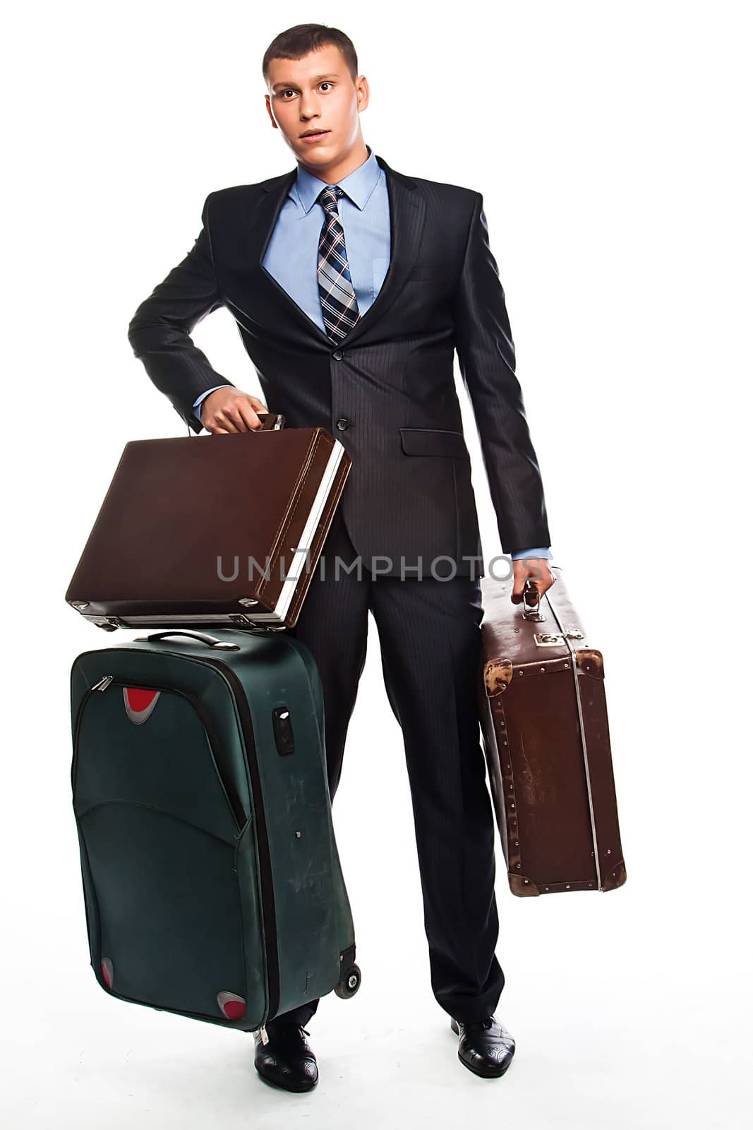 Young businessman with three suitcases by korvin79