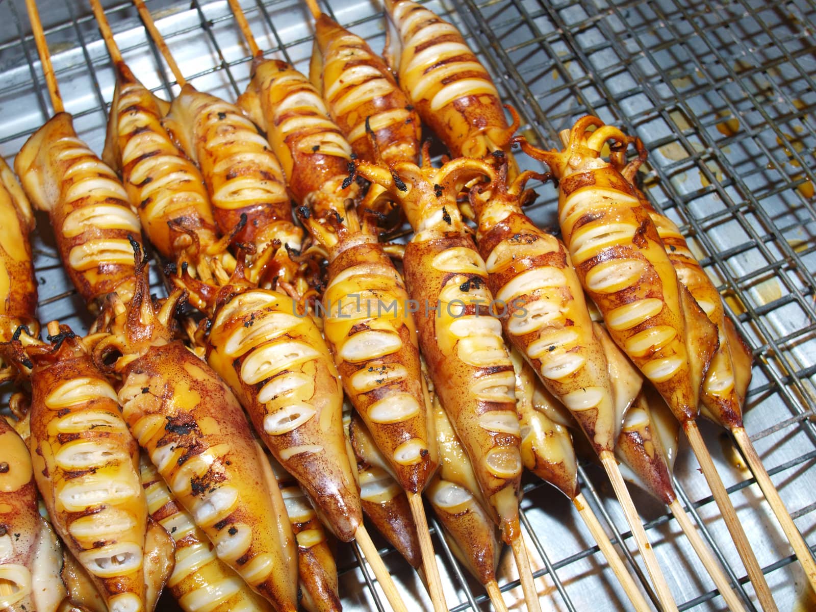 Many of grilled squid in thai market