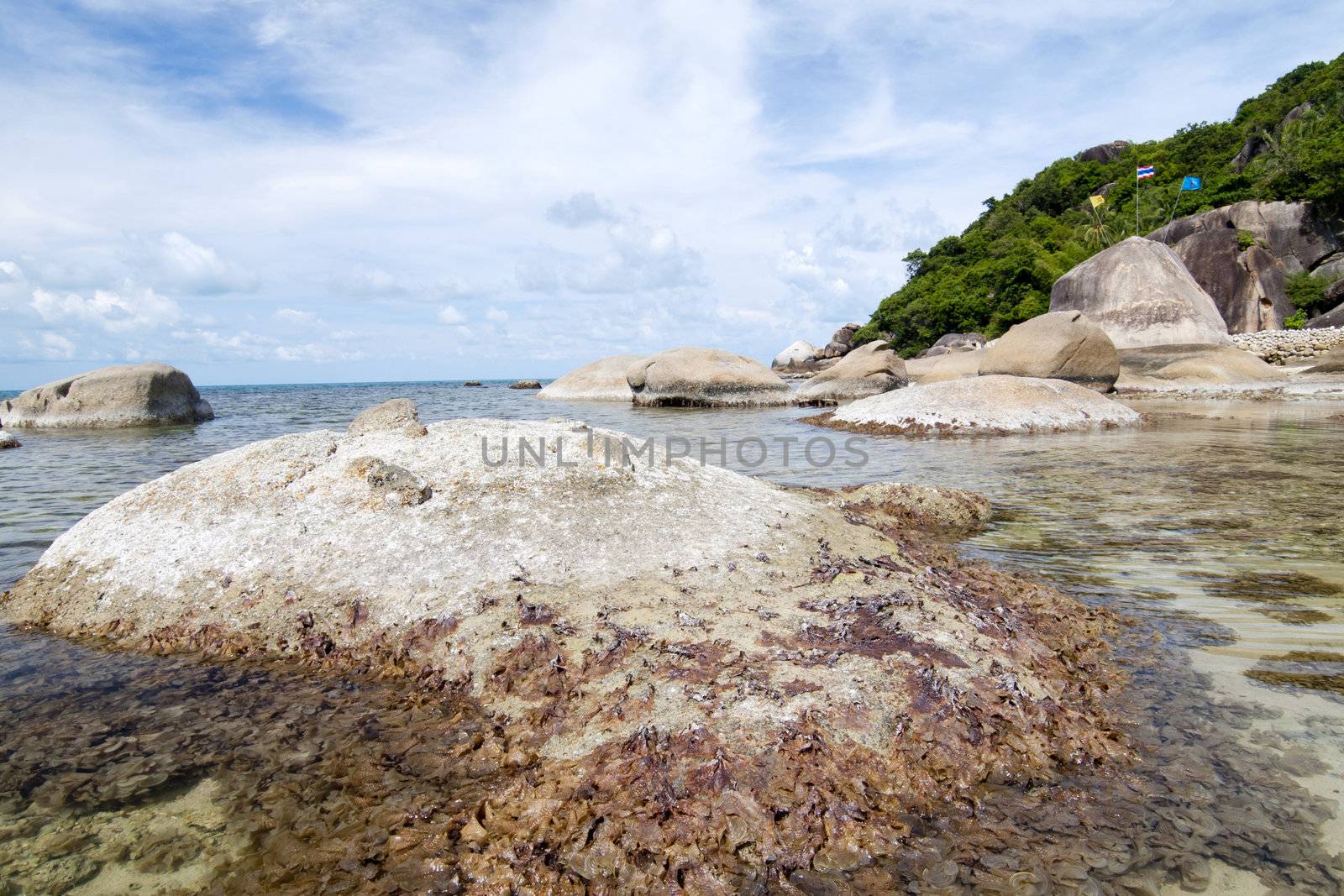 Thai island of Koh Samui. The pile of rocks on the beach